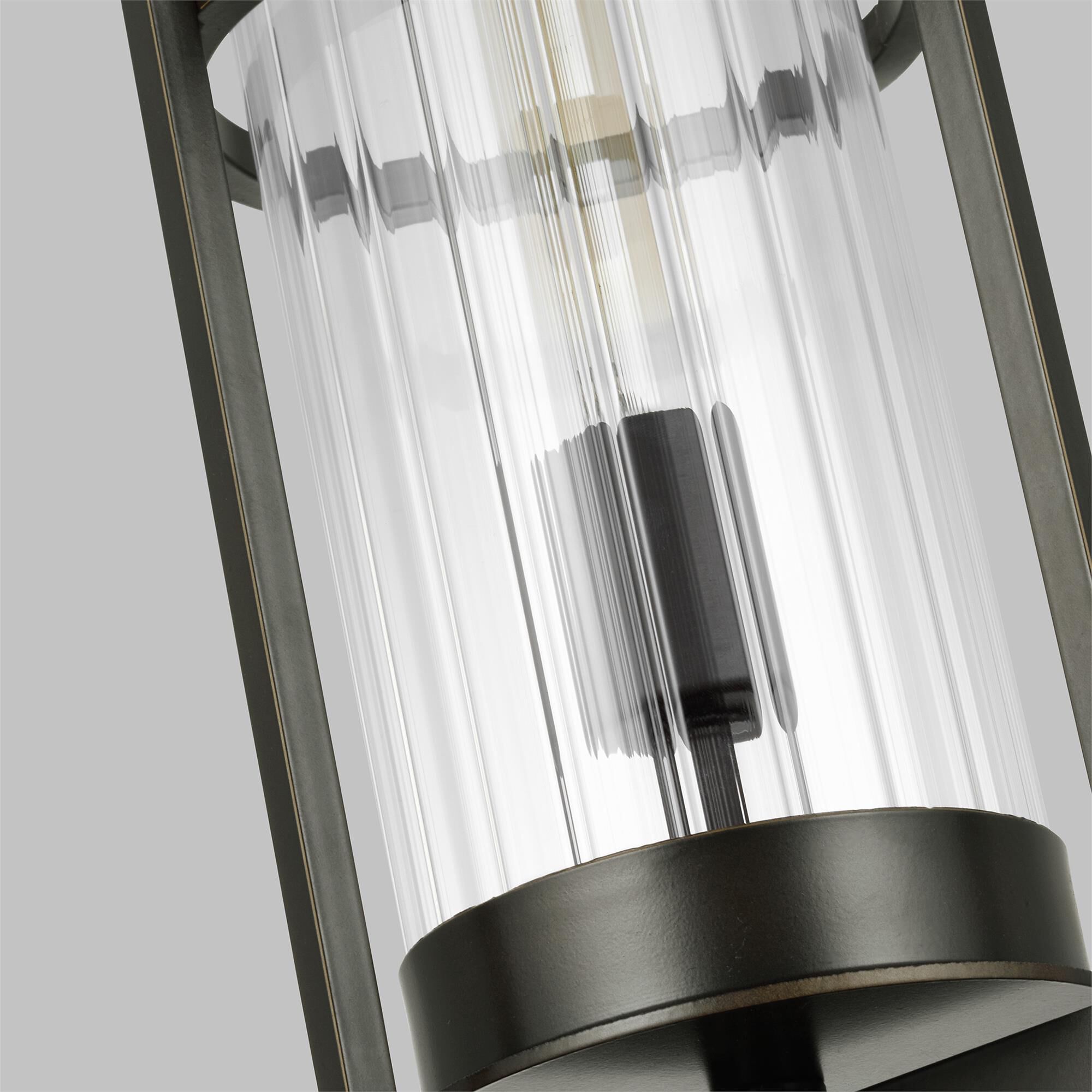 Shown in Antique Bronze finish and Clear Fluted glass and Clear Fluted Glass shade