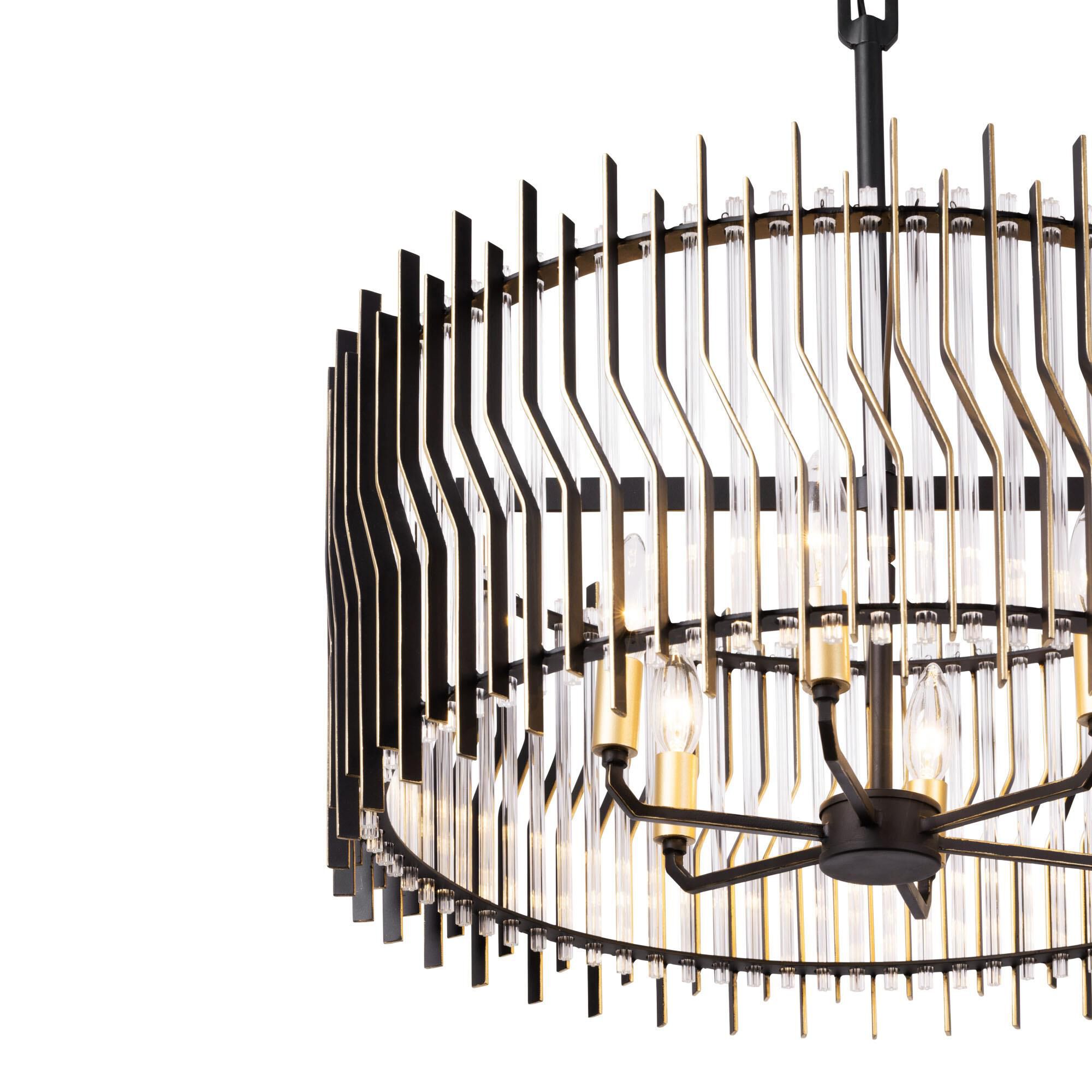Shown in Matte Black/French Gold finish and Modern Clear Fluted shade