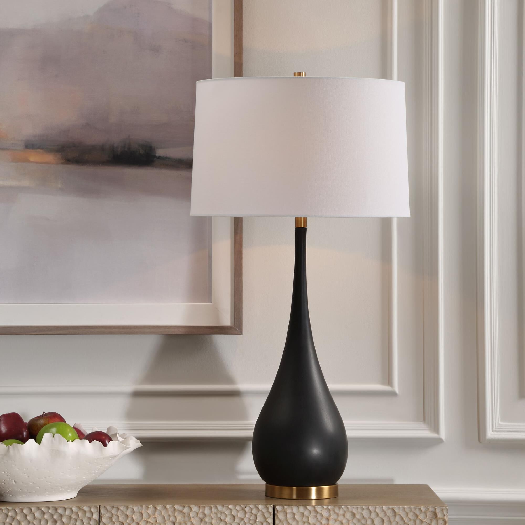 Shown in This Exquisite Table Lamp Features A Tear-Drop Shaped Base Handcrafted From Sleek, Man-Made Black St finish and Round Hardback shade