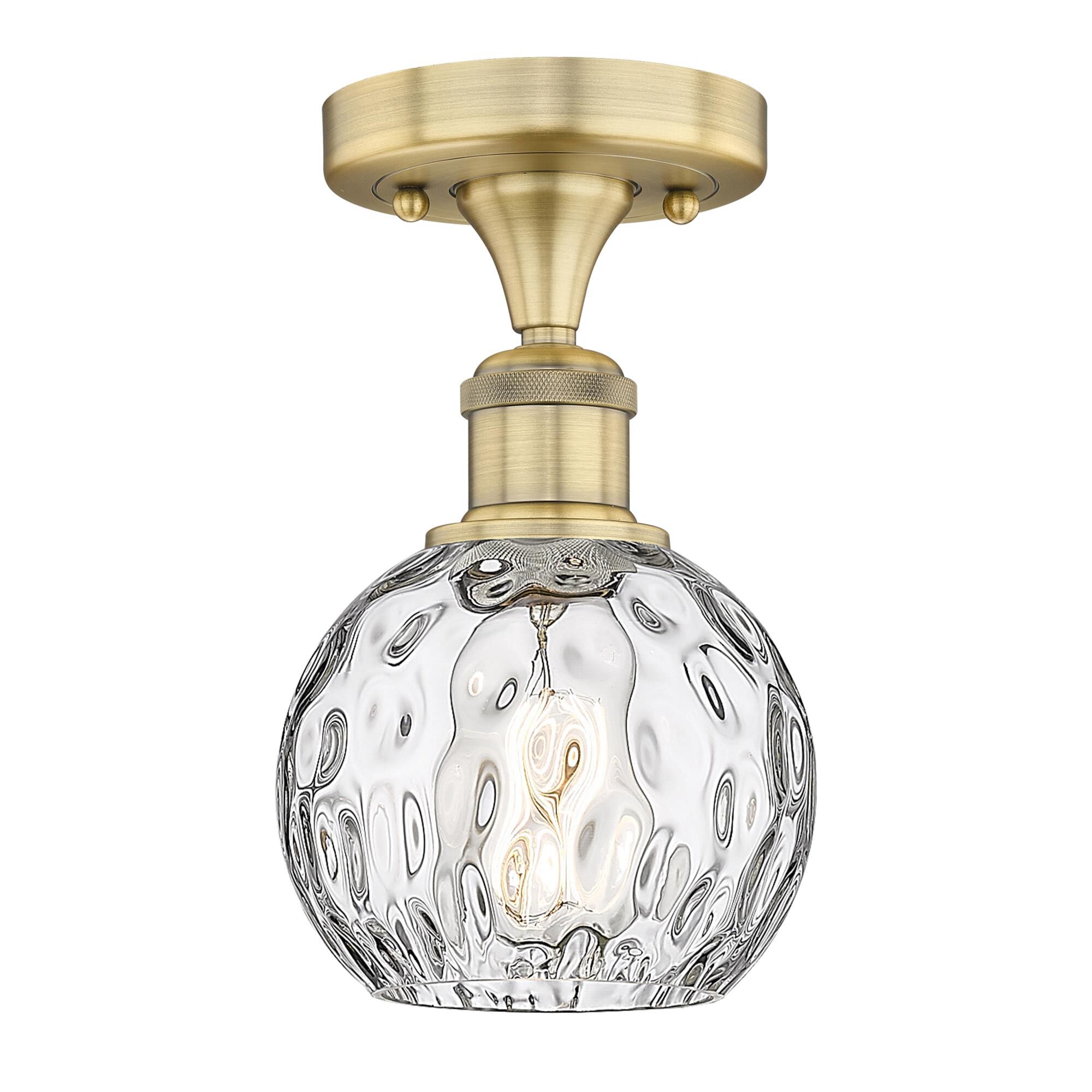 Shown in Brushed Brass finish and Clear Water Glass glass