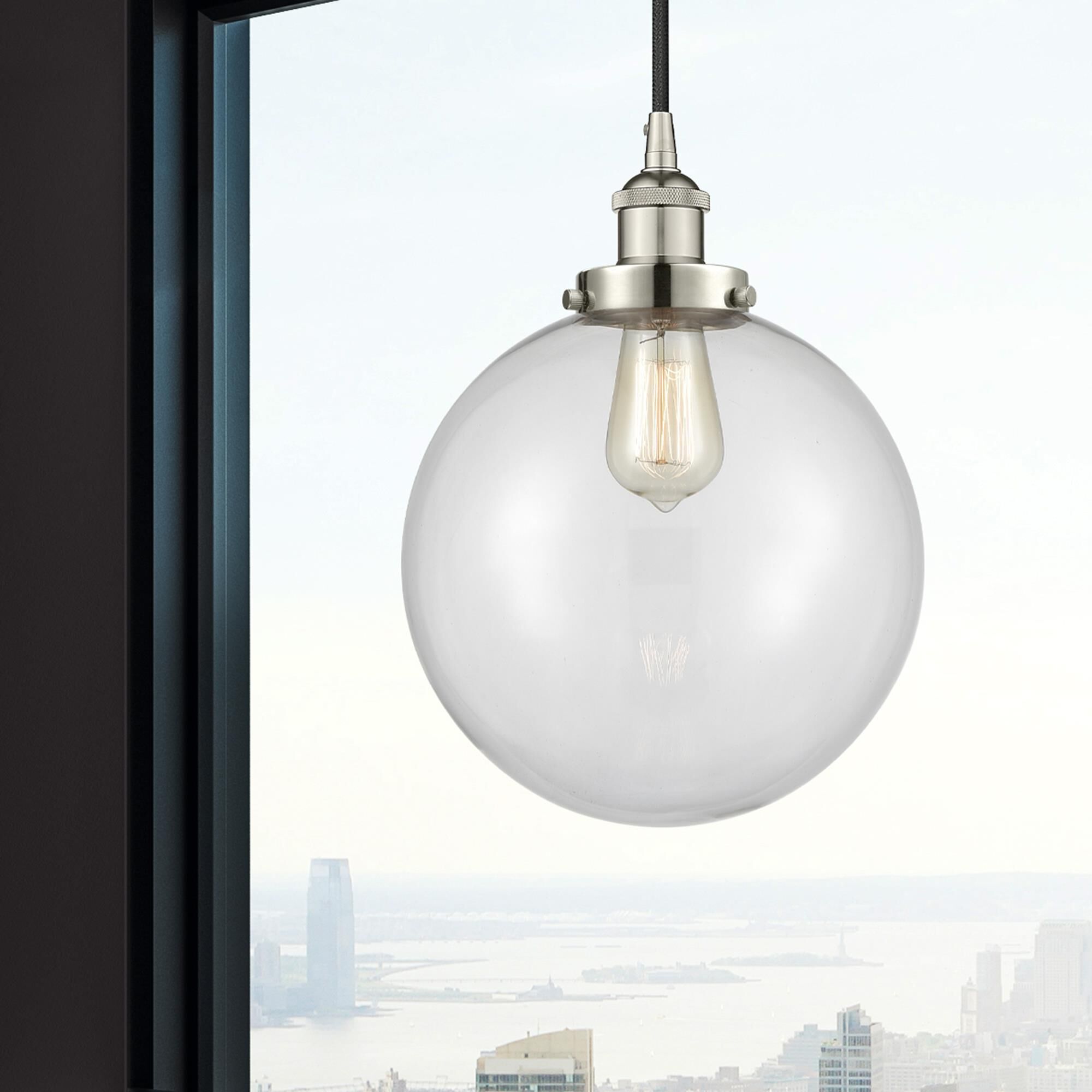 Shown in Polished Nickel finish and Clear Beacon glass