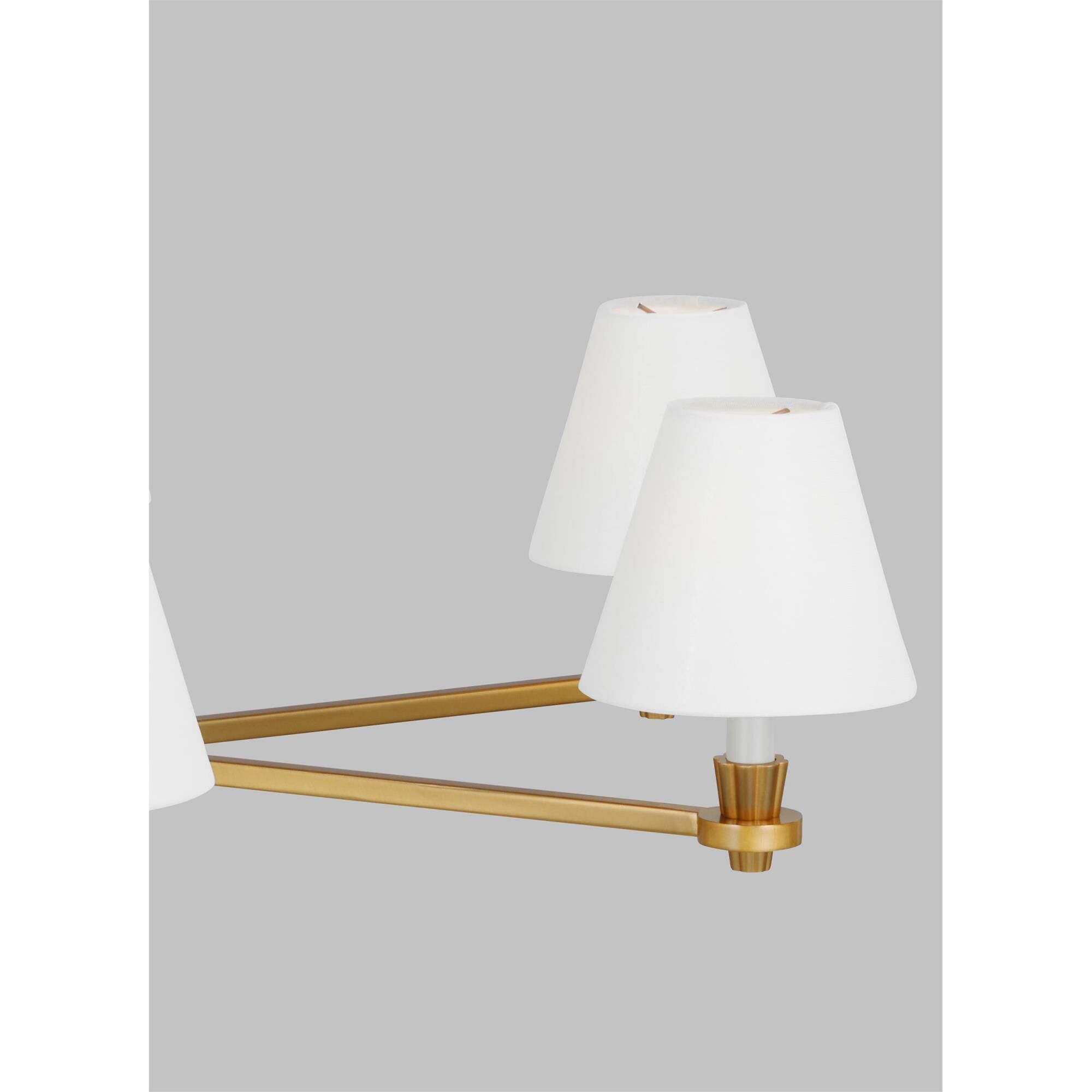 Shown in Burnished Brass finish and White Linen Fabric s shade