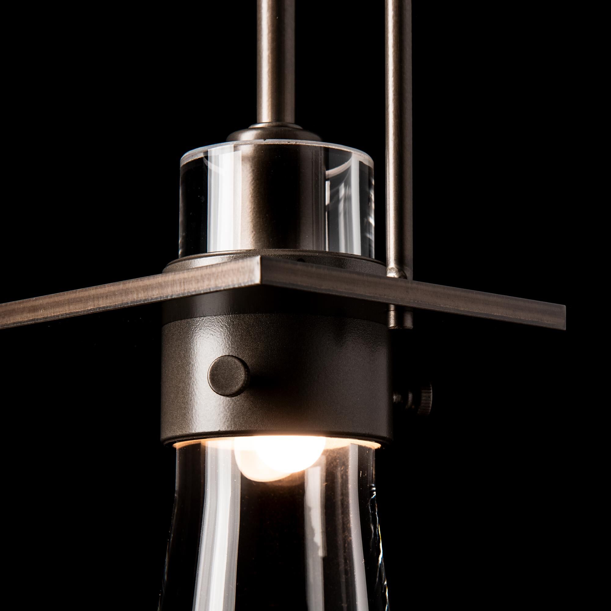 Shown in Dark Smoke finish and Clear glass