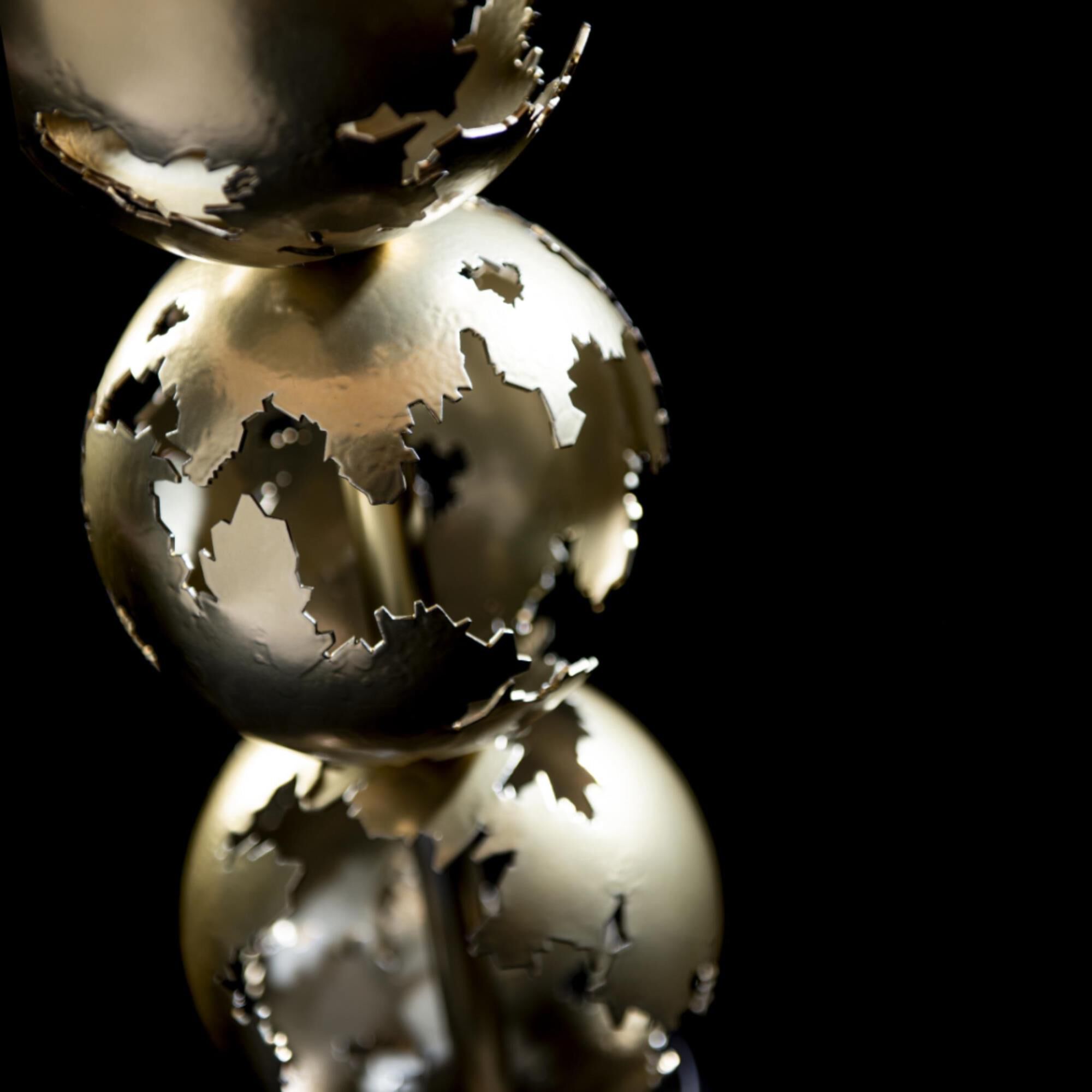 Shown in Modern Brass and Black finish and Natural Anna shade