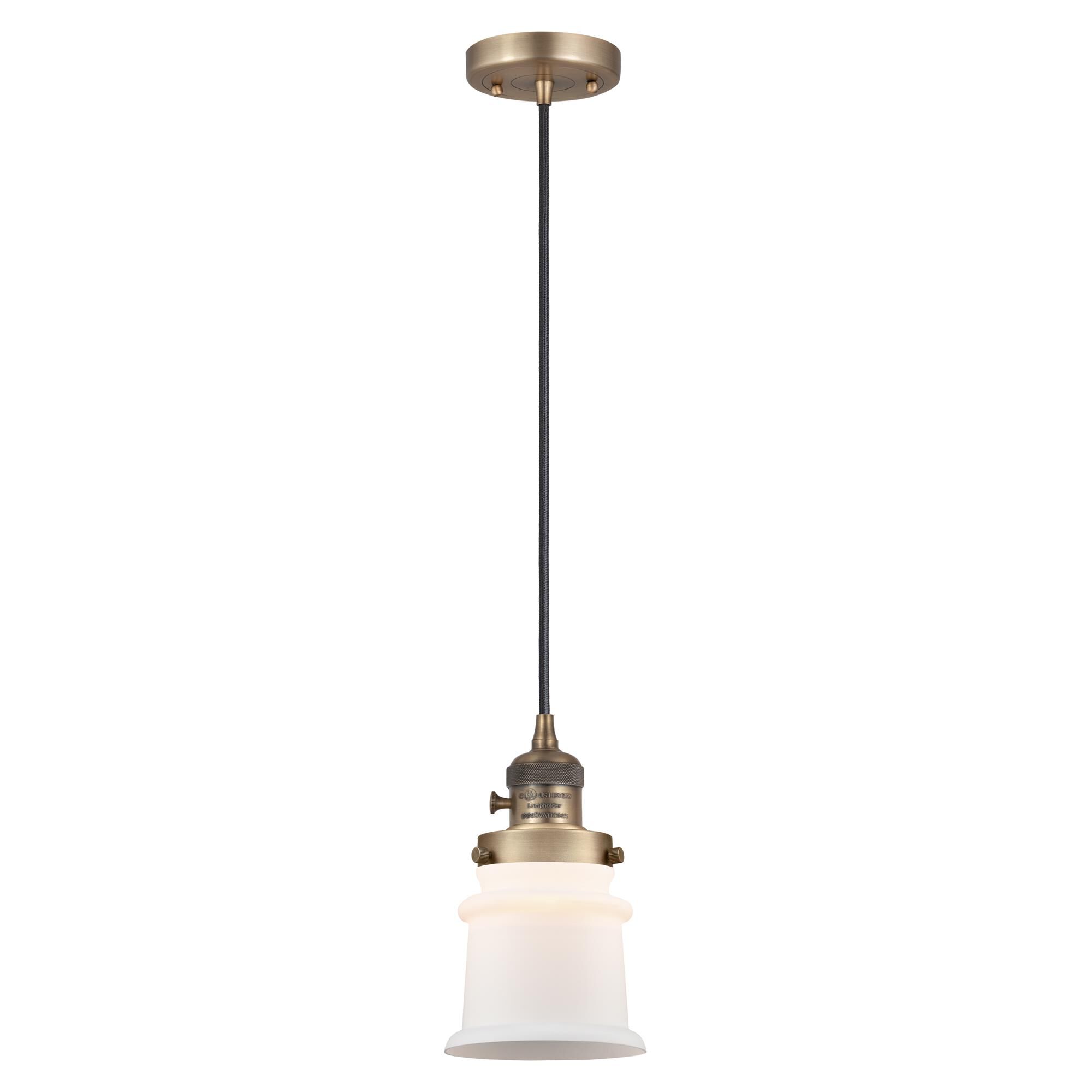 Shown in Brushed Brass finish and Matte White glass