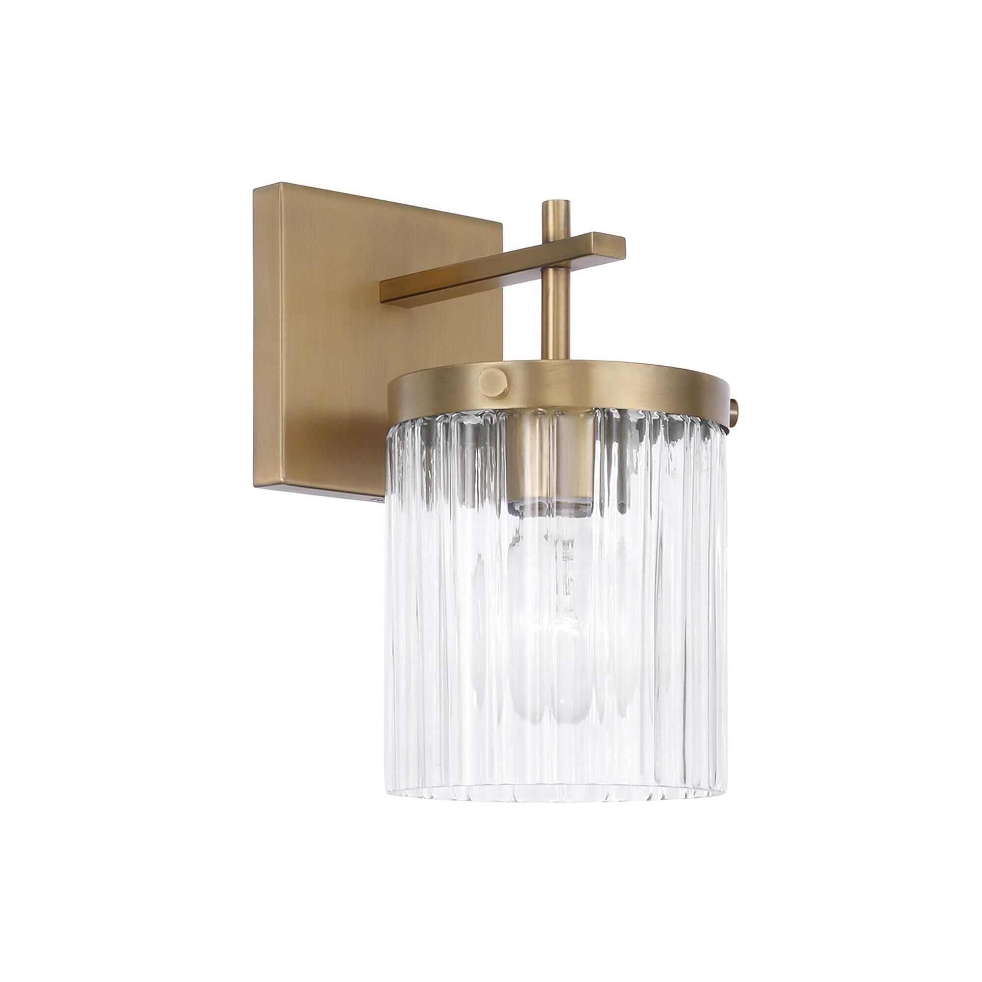 Shown in Aged Brass finish and Beveled Fluted glass