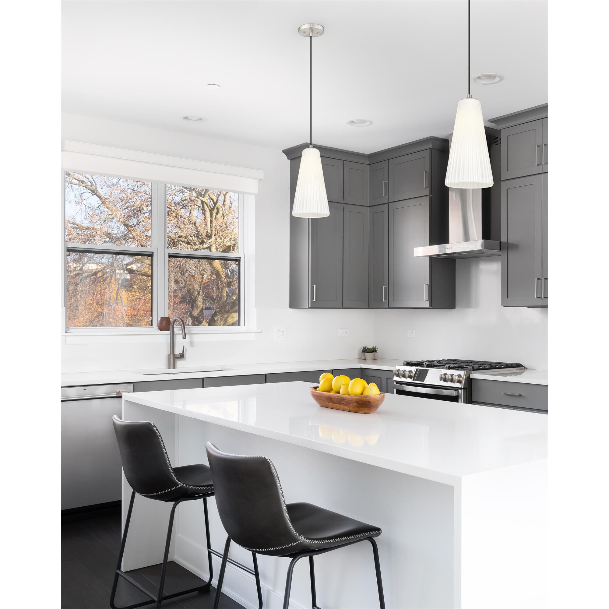 Shown in Brushed Nickel finish and White glass and White shade