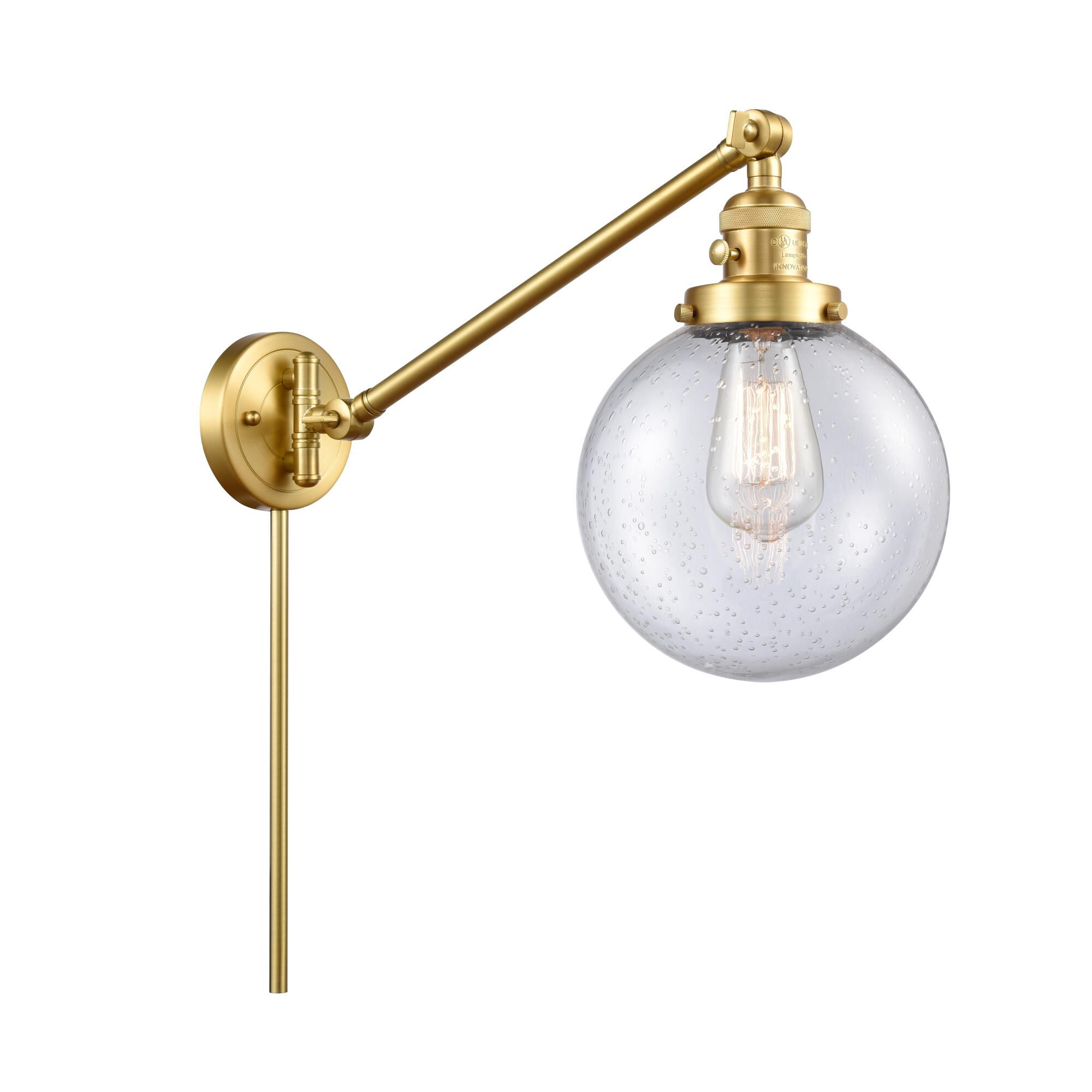 Shown in Satin Gold finish and Seedy Beacon glass