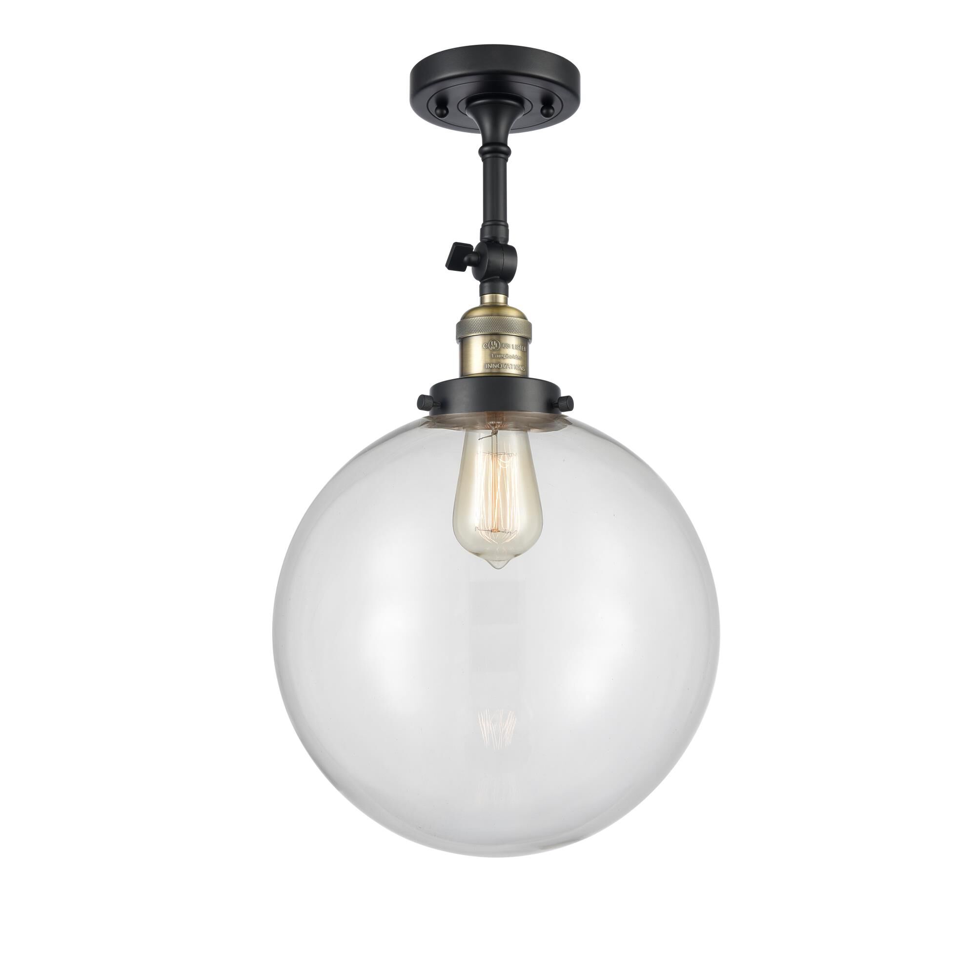 Shown in Black Antique Brass finish and Clear Beacon glass