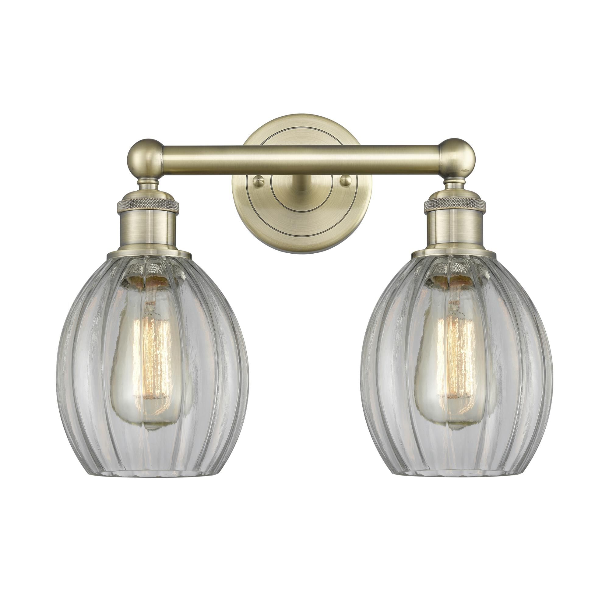 Shown in Antique Brass finish and Clear glass