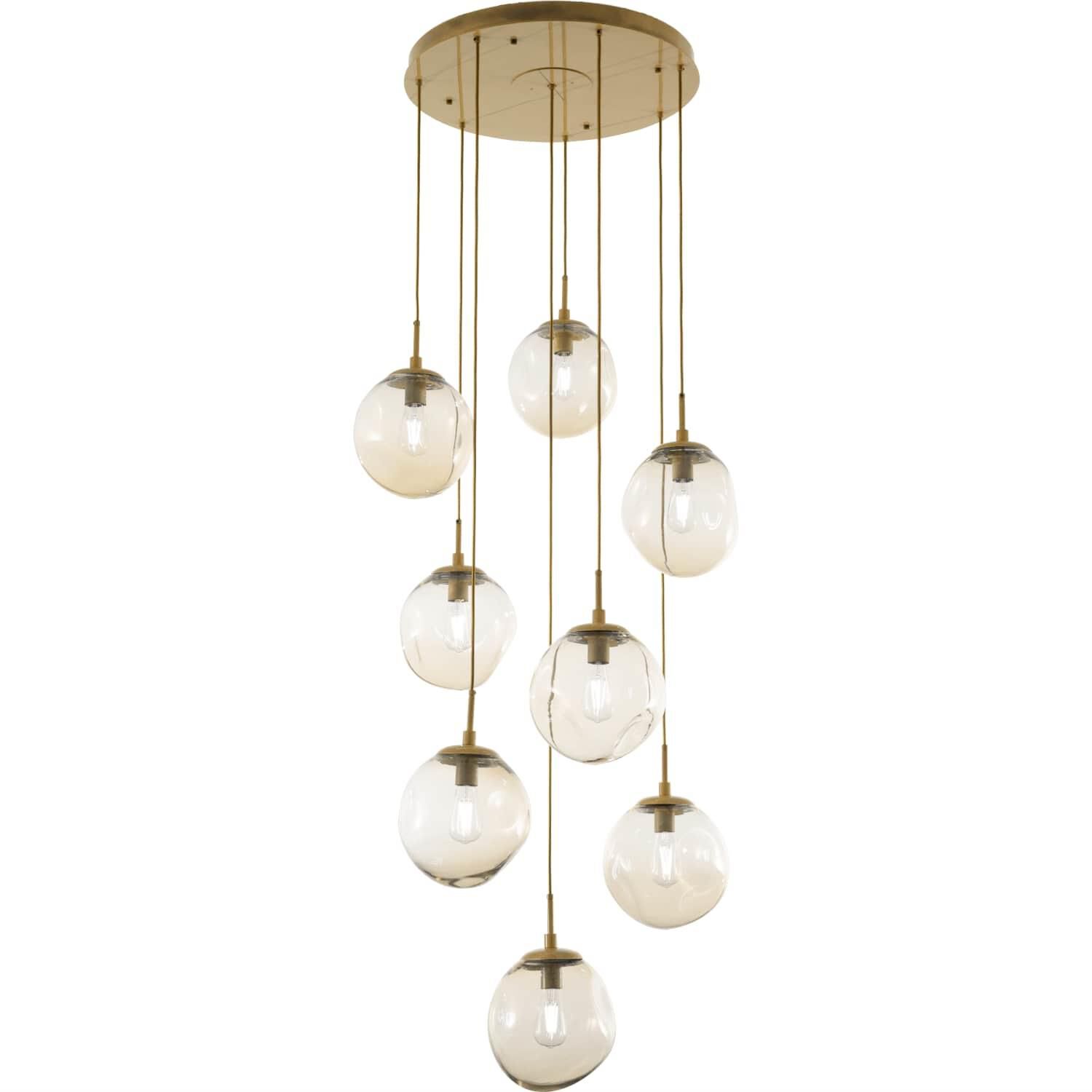 Shown in Gilded Brass finish and Blown Amber glass