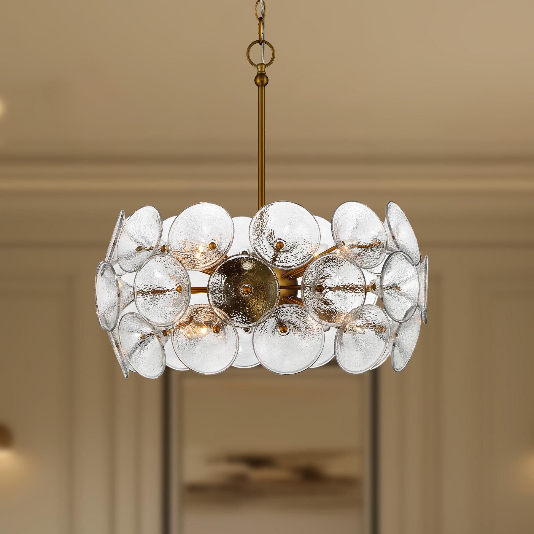 Shown in Soft Brass finish and Textured Clear Fluted glass