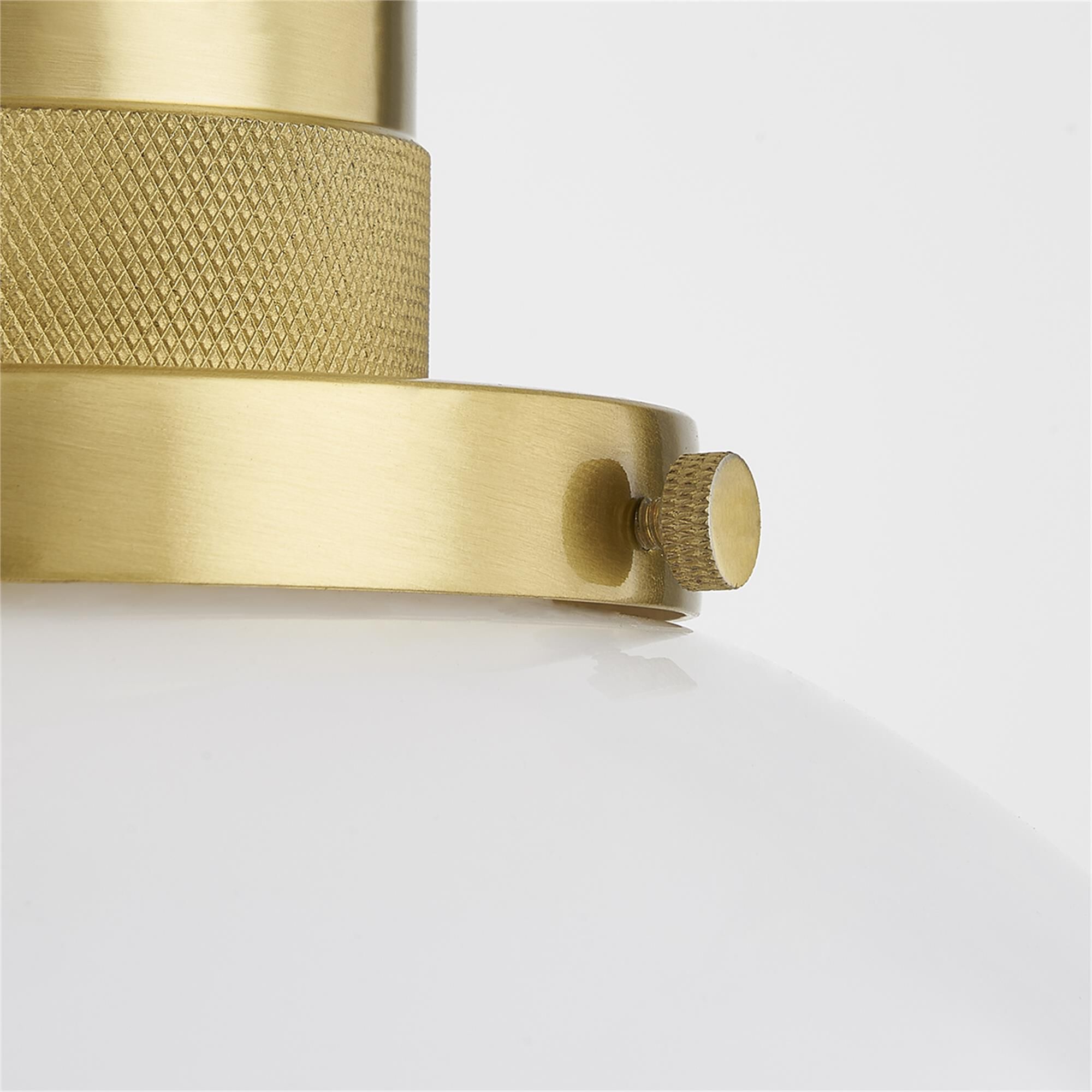 Shown in Aged Brass finish and Opal Glossy glass