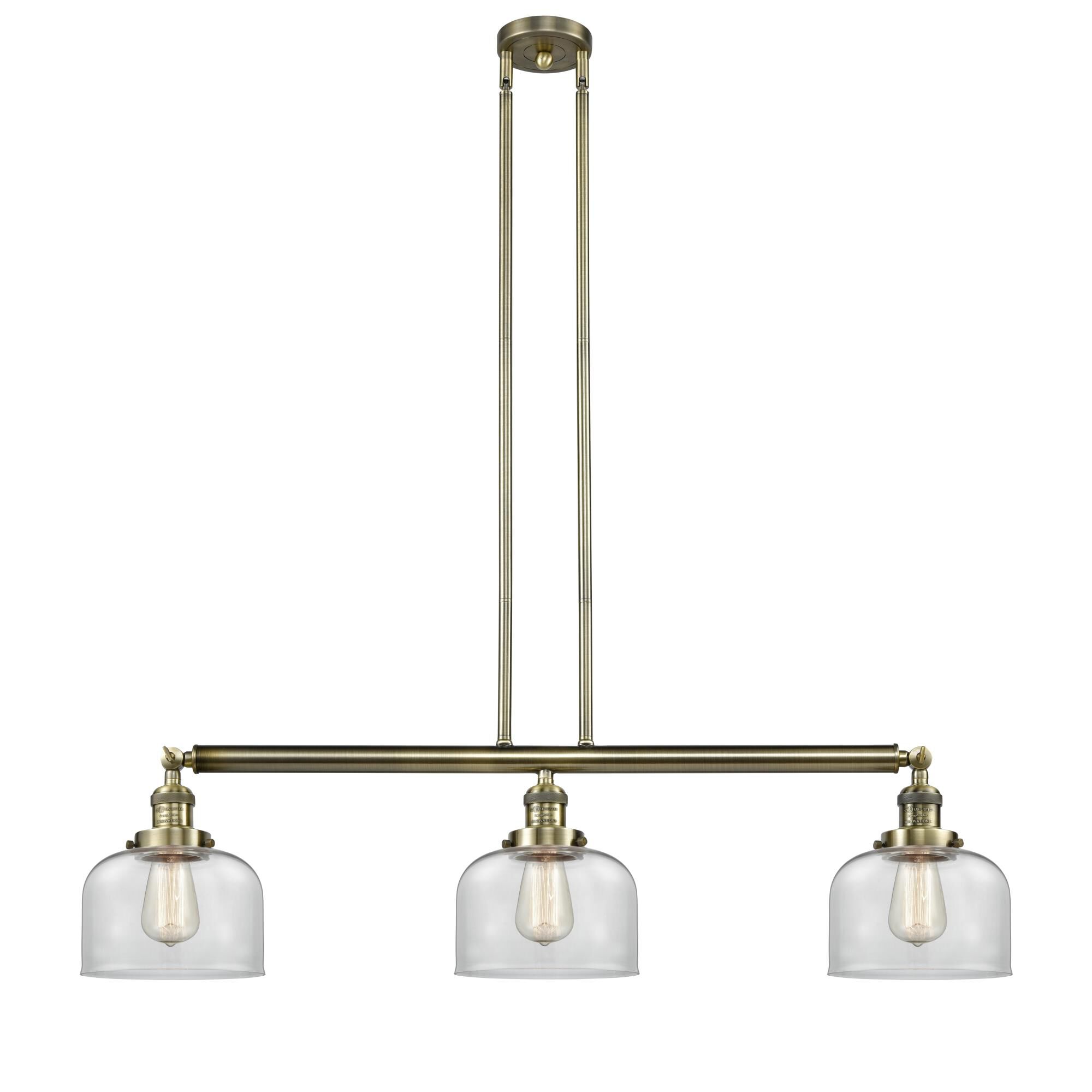 Shown in Antique Brass finish and Clear glass