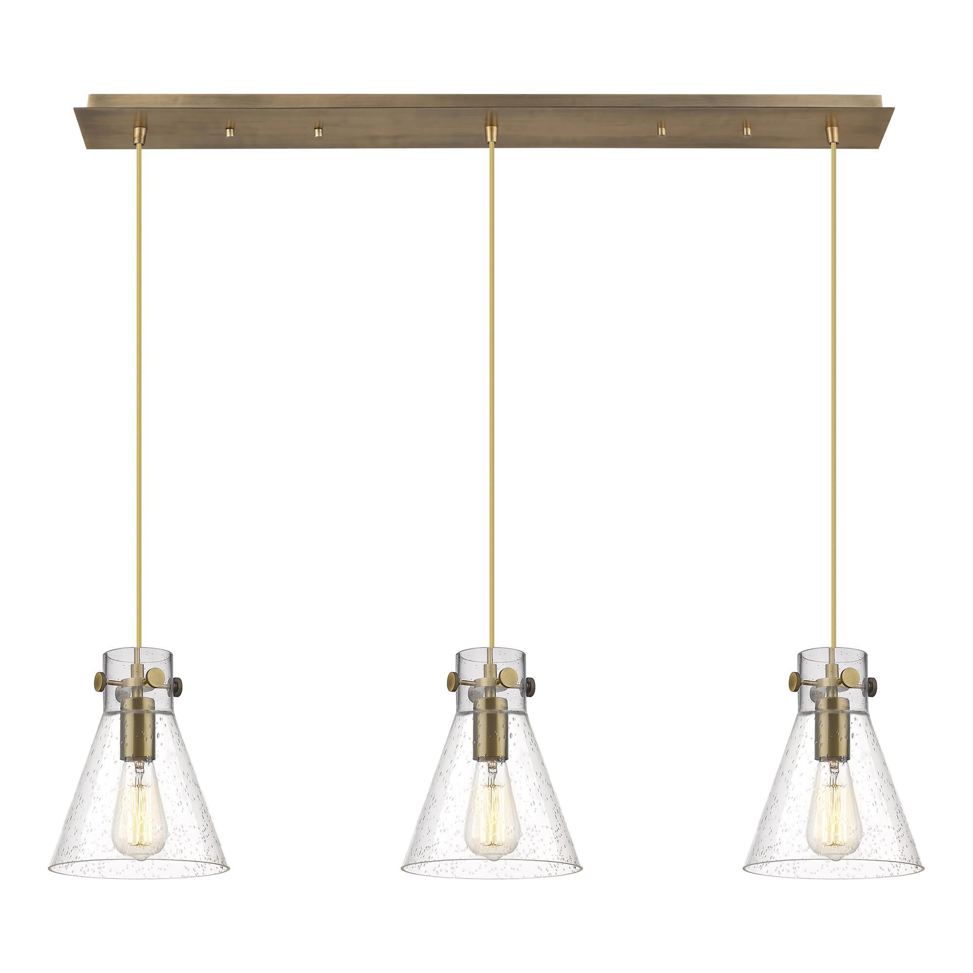 Shown in Brushed Brass finish and Seedy glass and Seedy Glass shade