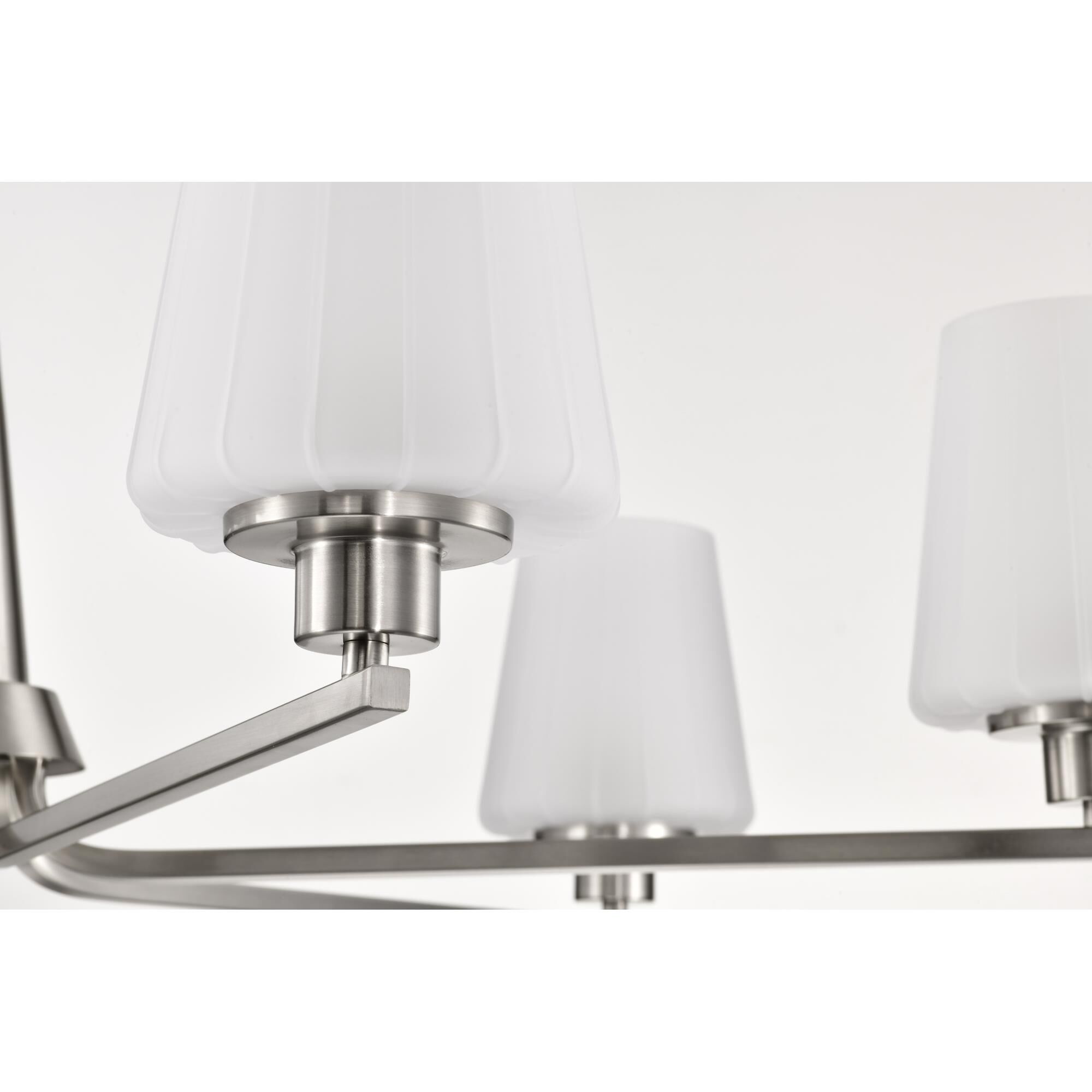 Shown in Brushed Nickel finish and Etched White glass