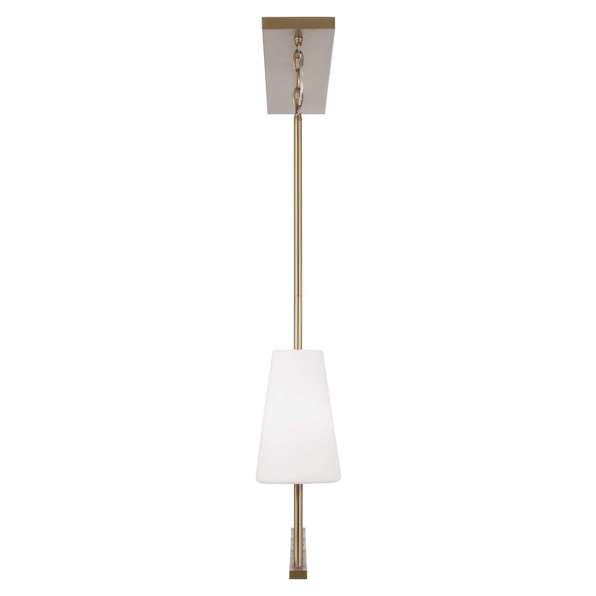 Shown in Aged Brass finish and Soft White glass