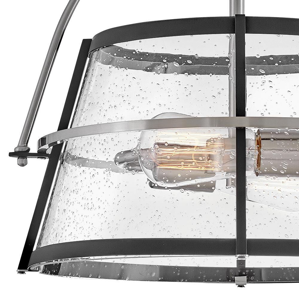 Shown in Brushed Nickel with Black Accents finish and Clear Seedy glass