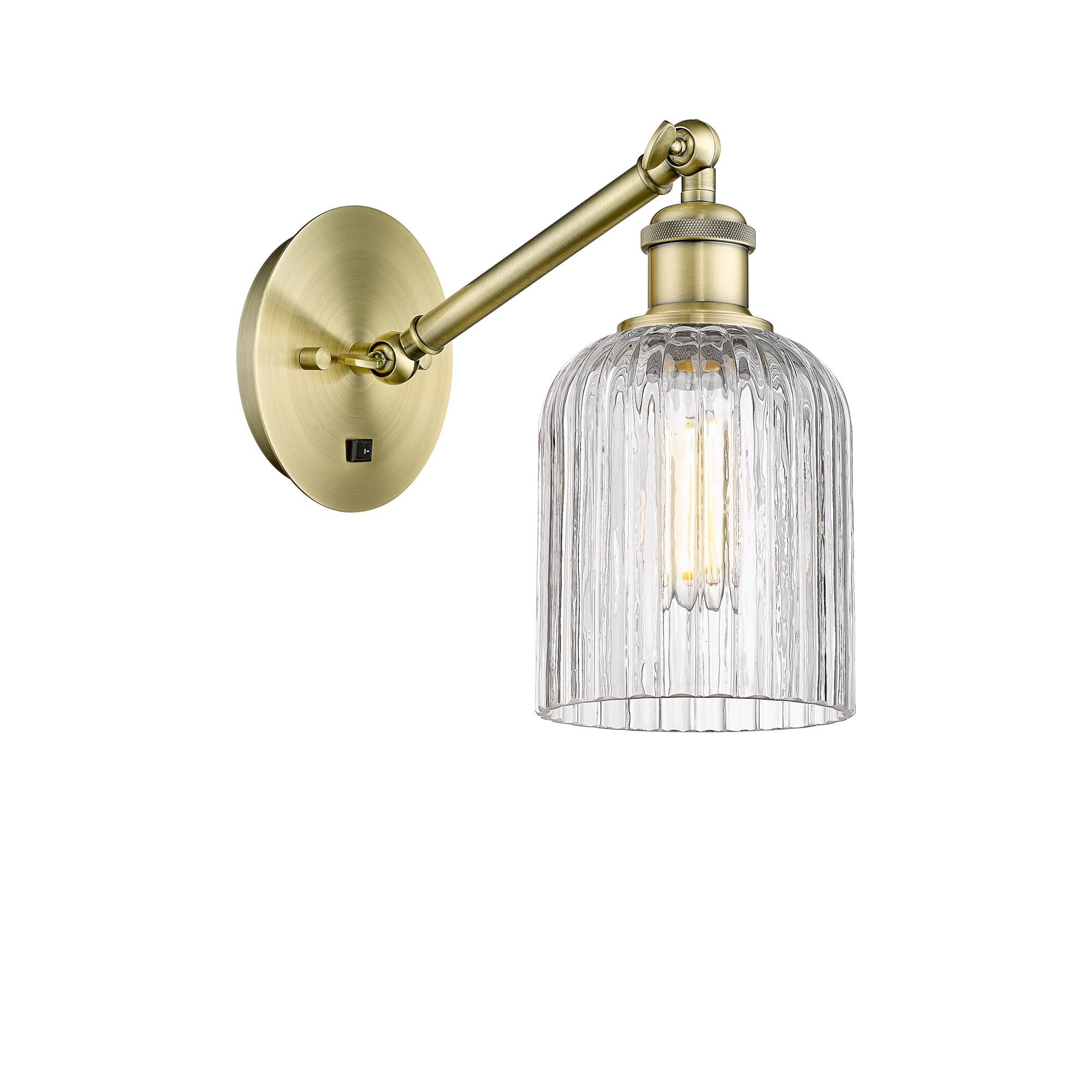 Shown in Antique Brass finish and Clear glass
