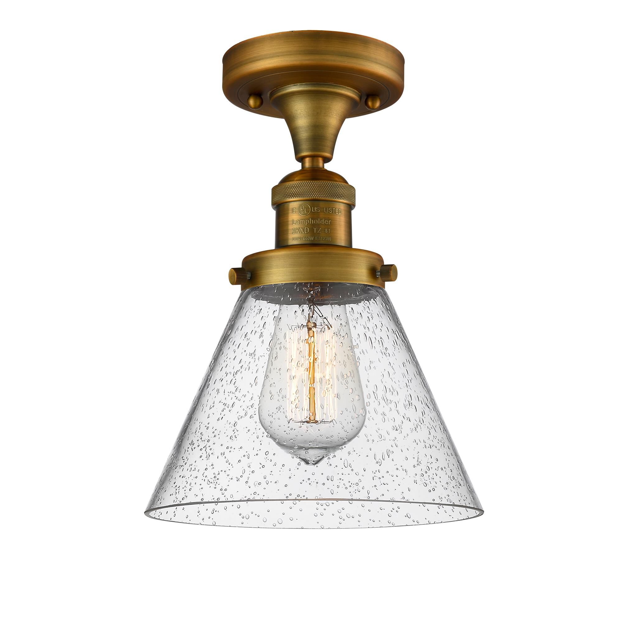Shown in Brushed Brass finish and Seedy glass