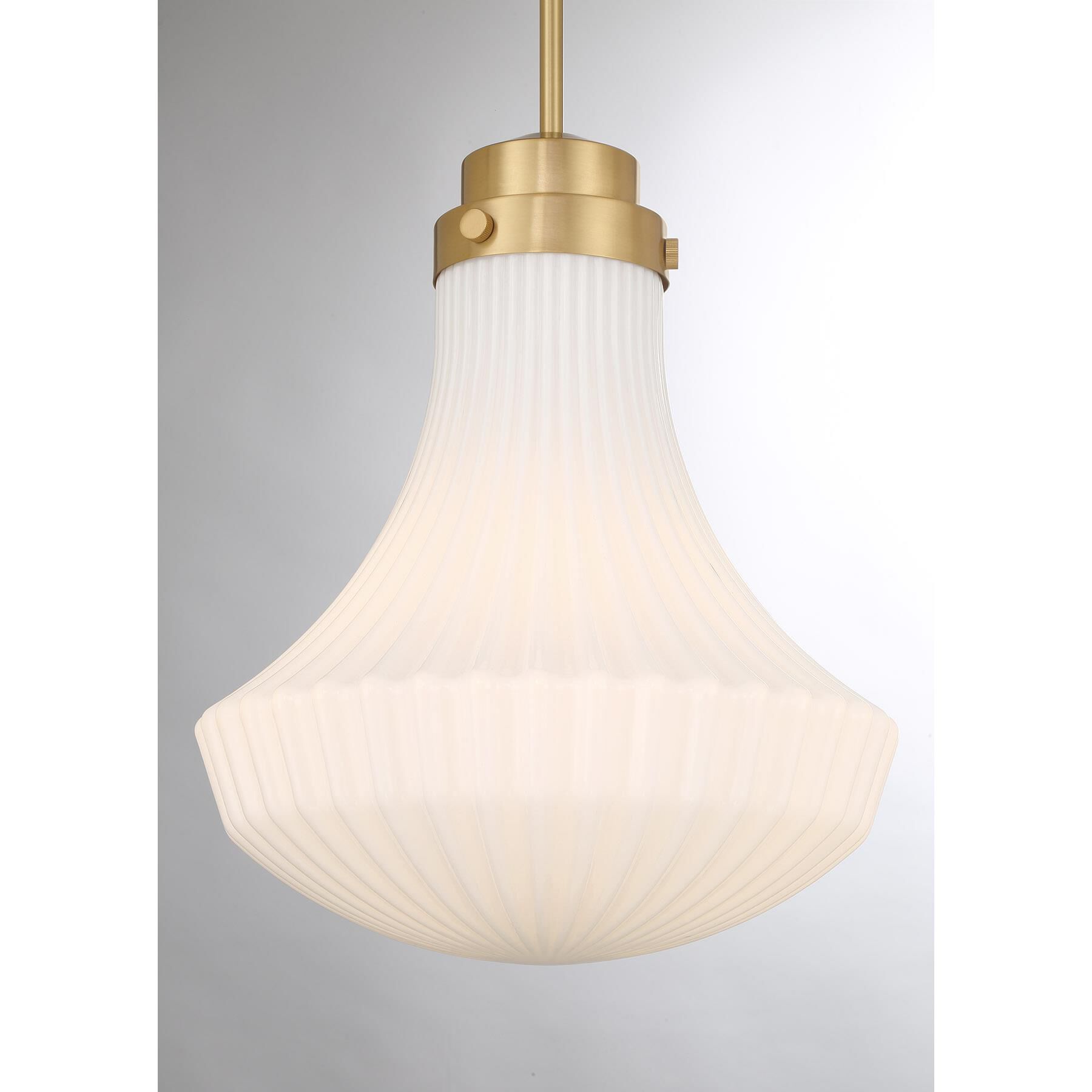 Shown in Warm Brass finish and White Ribbed glass