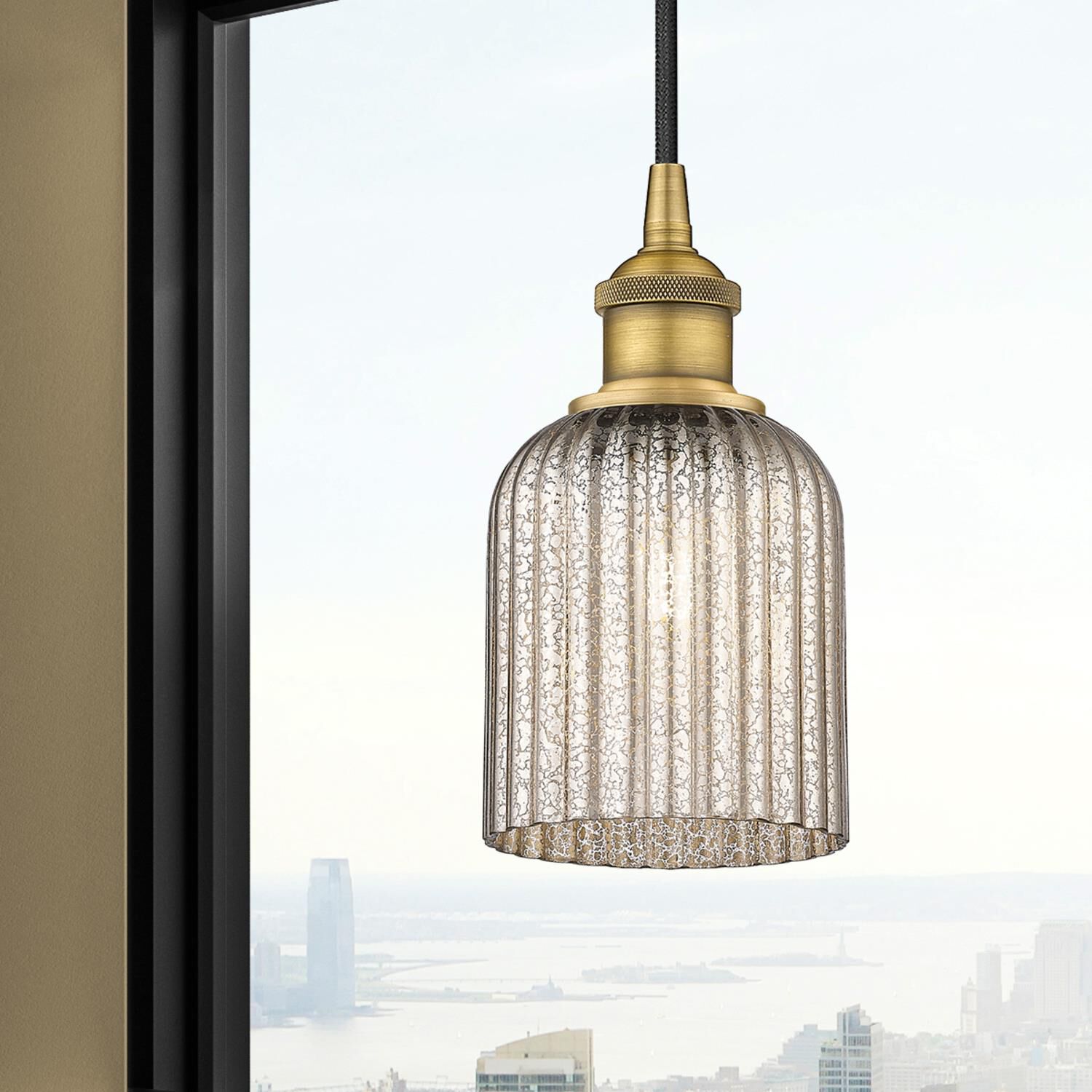 Shown in Brushed Brass finish and Mercury glass