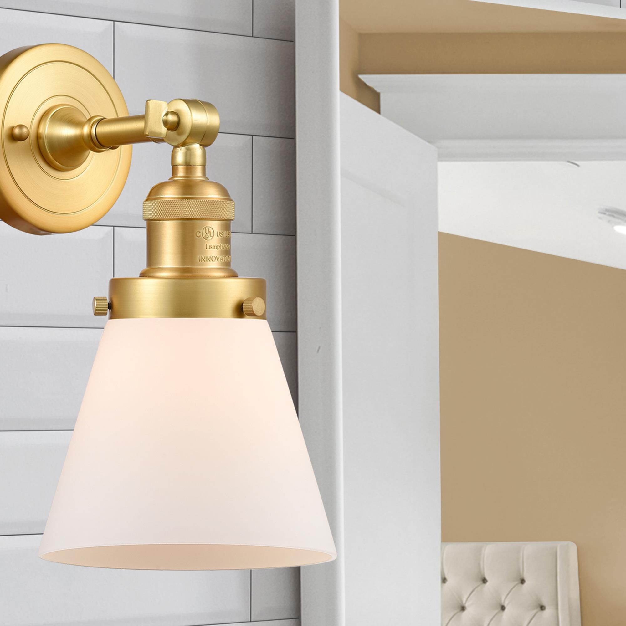 Shown in Satin Gold finish and Matte White Cased Small Cone glass