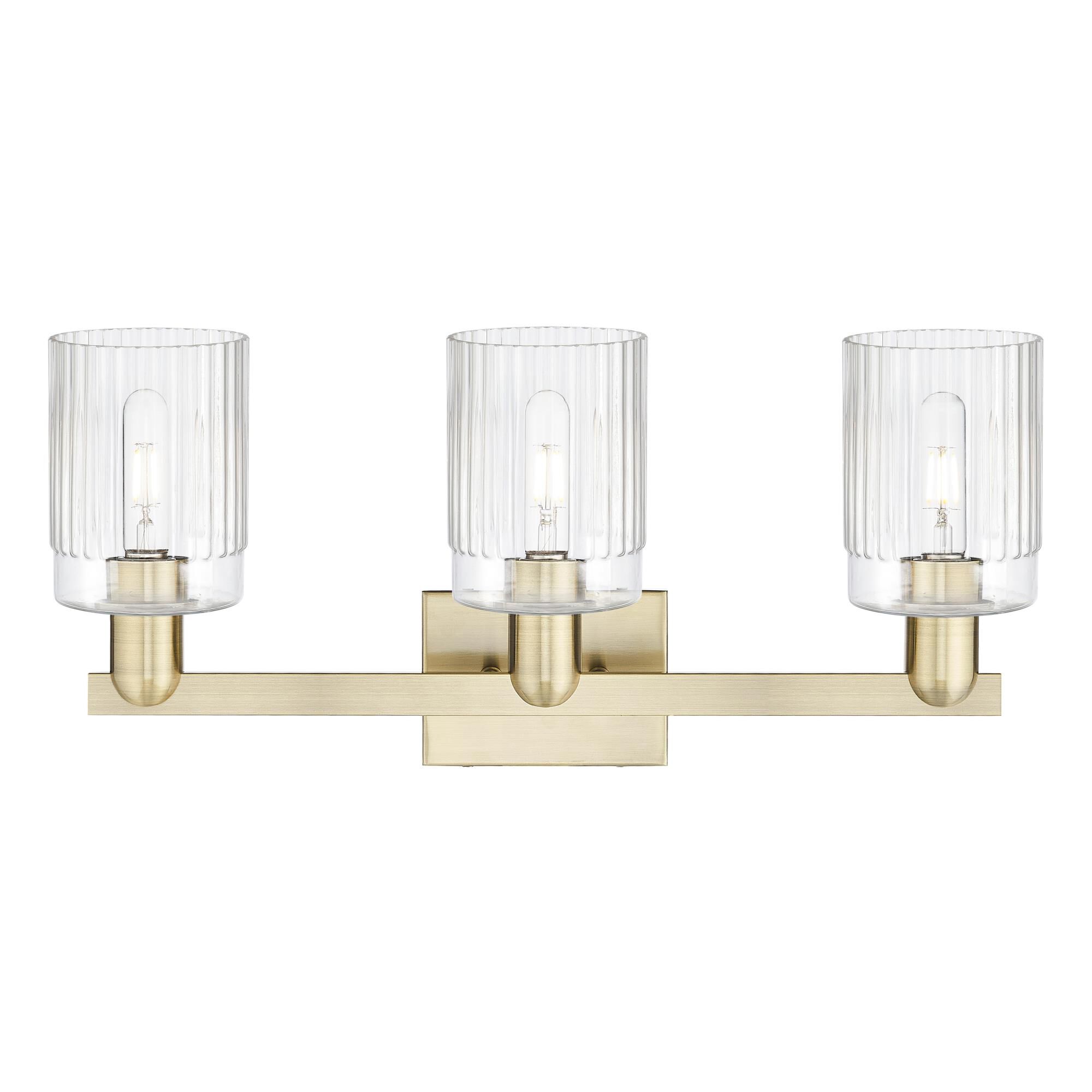 Shown in Antique Brass finish and Clear glass