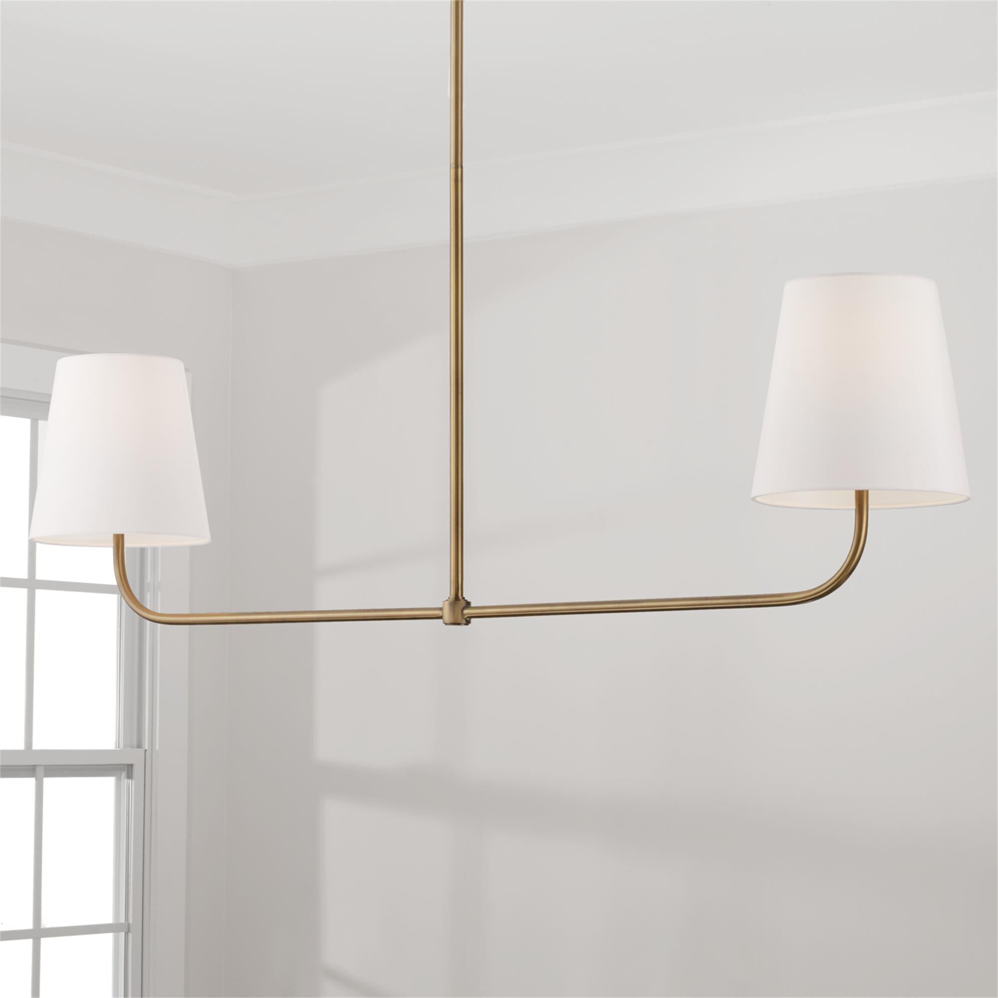 Shown in Aged Brass finish and White Fabric Stay-Straight shade