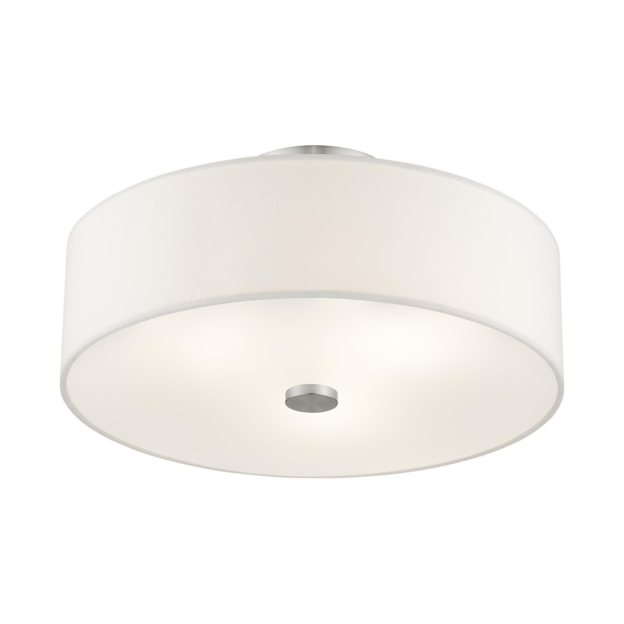 Shown in Brushed Nickel finish and Hand Crafted Off-White Fabric Hardback shade