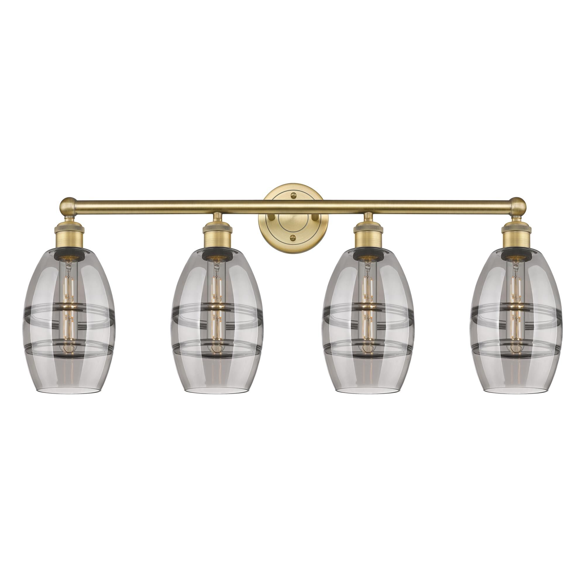 Shown in Brushed Brass finish and Light Smoke glass