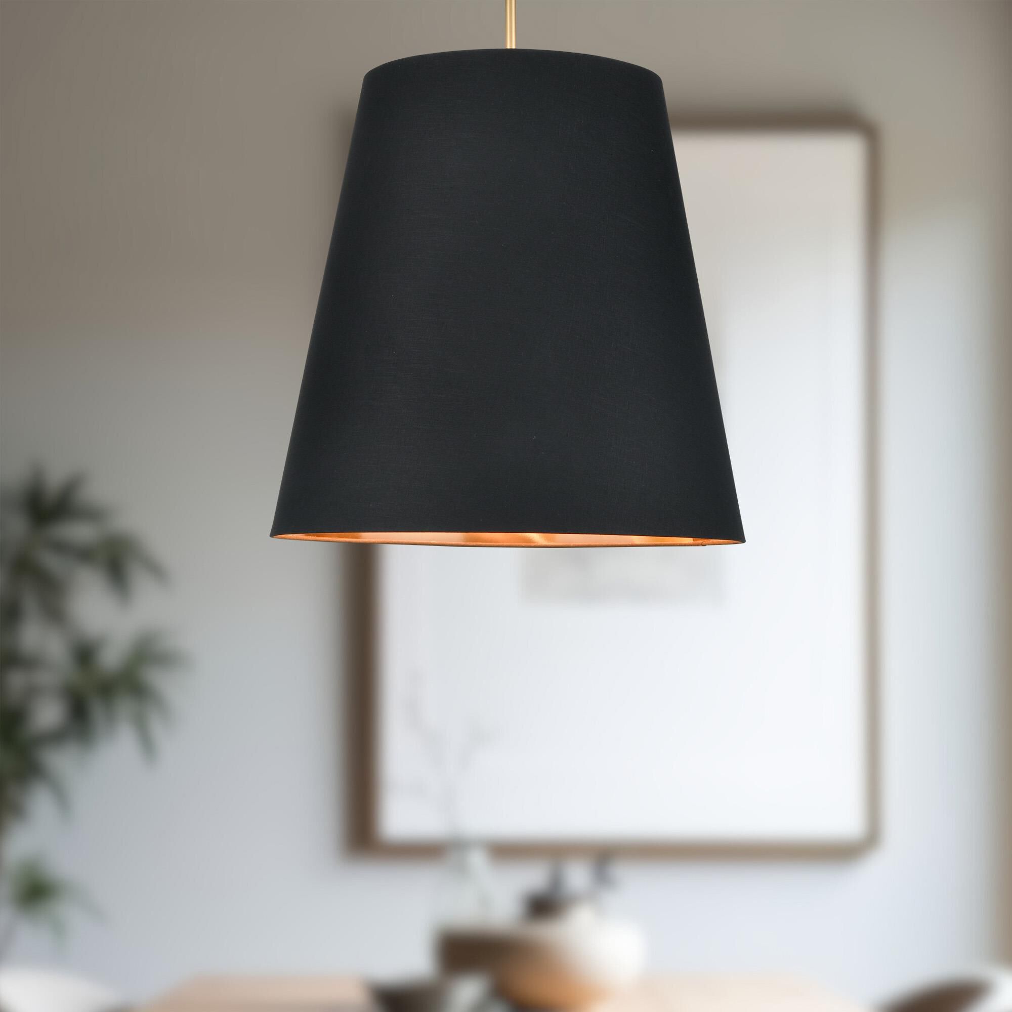 Shown in Brass, Black and Gold finish and Black Linen shade
