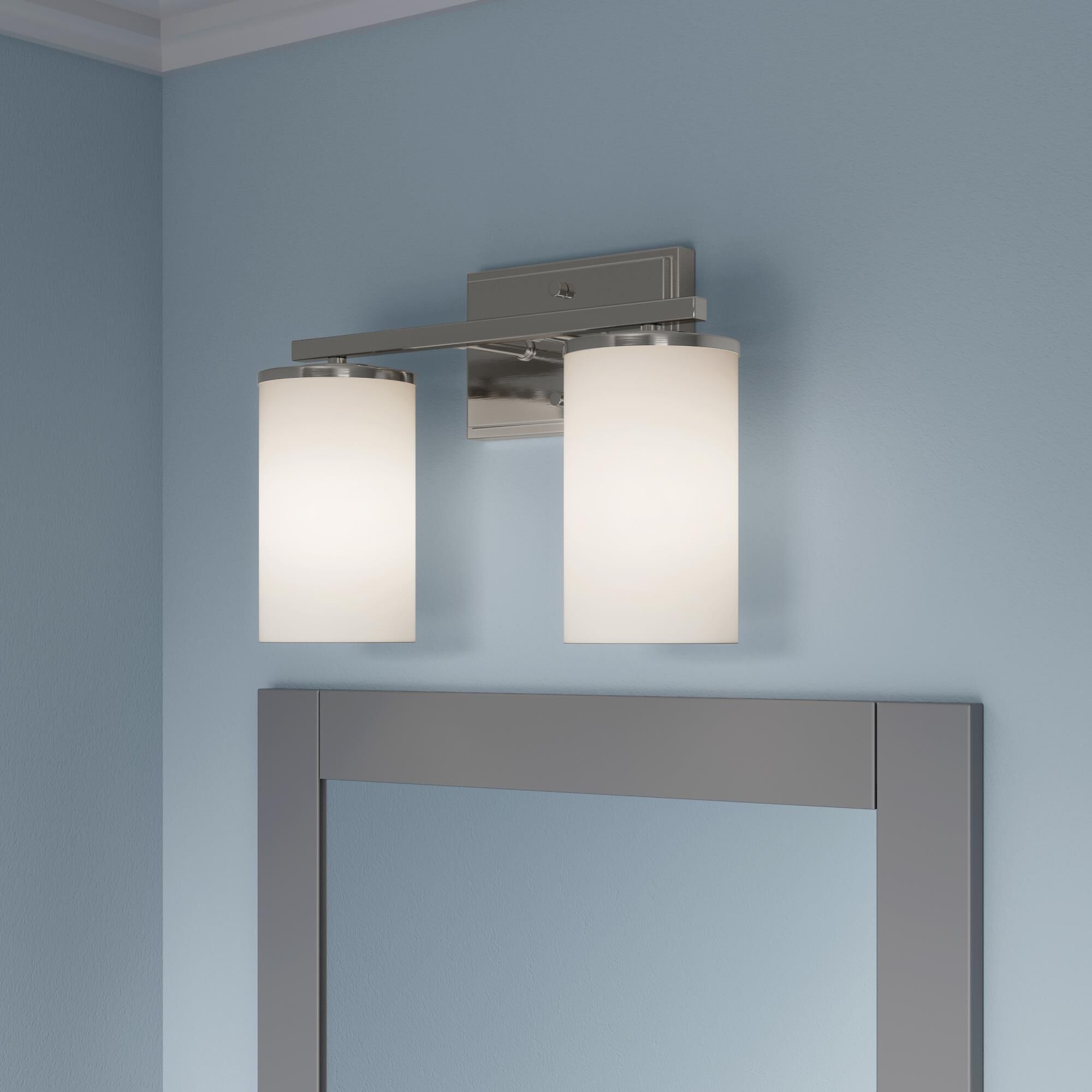 Shown in Brushed Nickel finish and Etched White glass