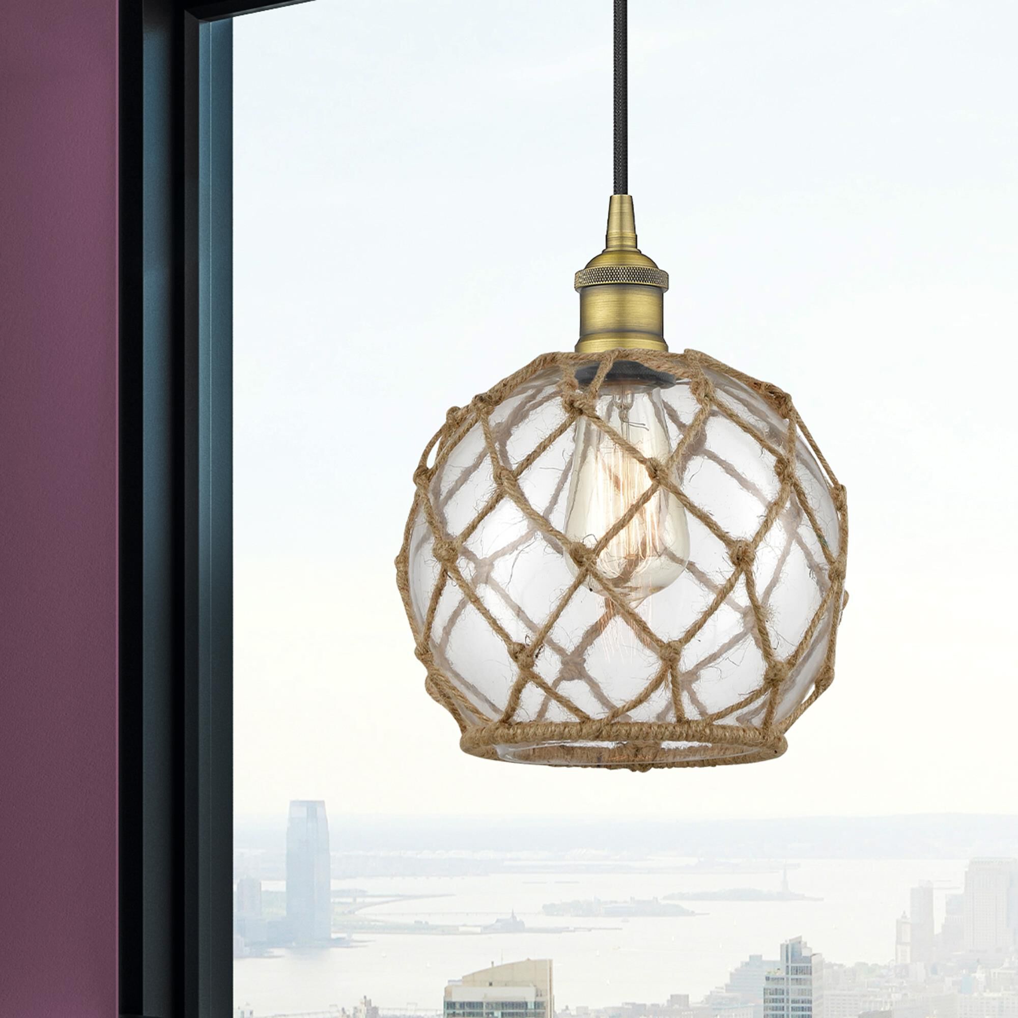 Shown in Brushed Brass finish and Clear Farmhouse With Brown Rope glass