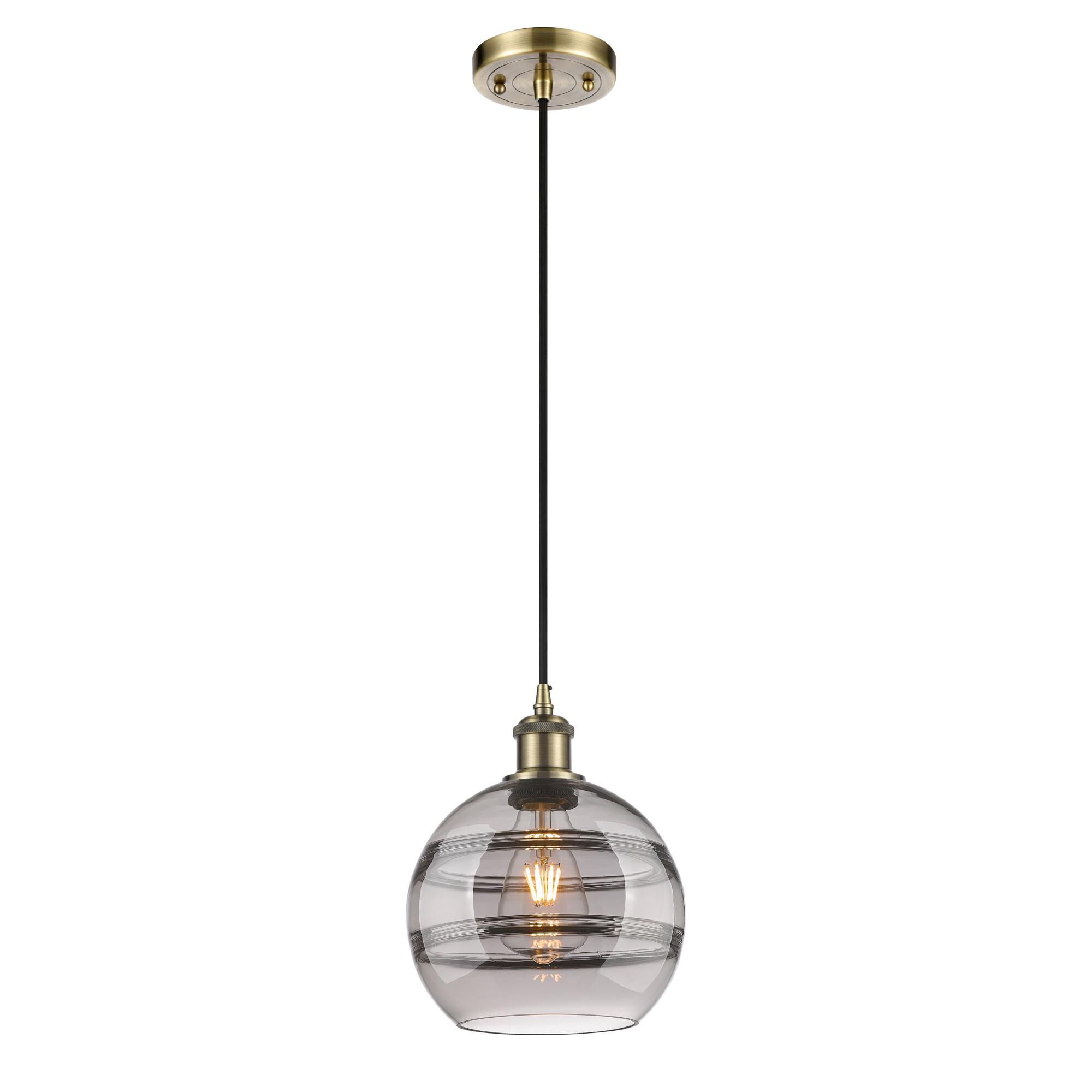 Shown in Antique Brass finish and Light Smoke glass