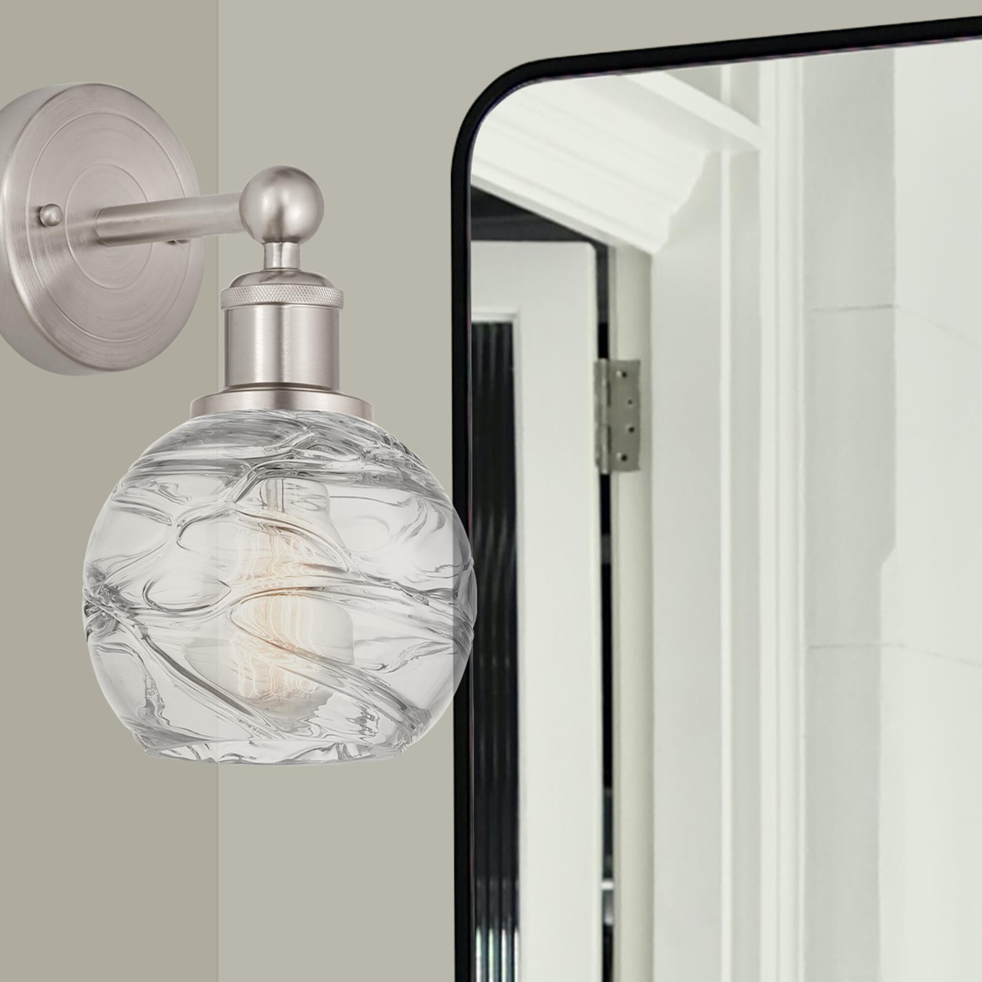 Shown in Brushed Satin Nickel  finish and Clear Deco Swirl glass