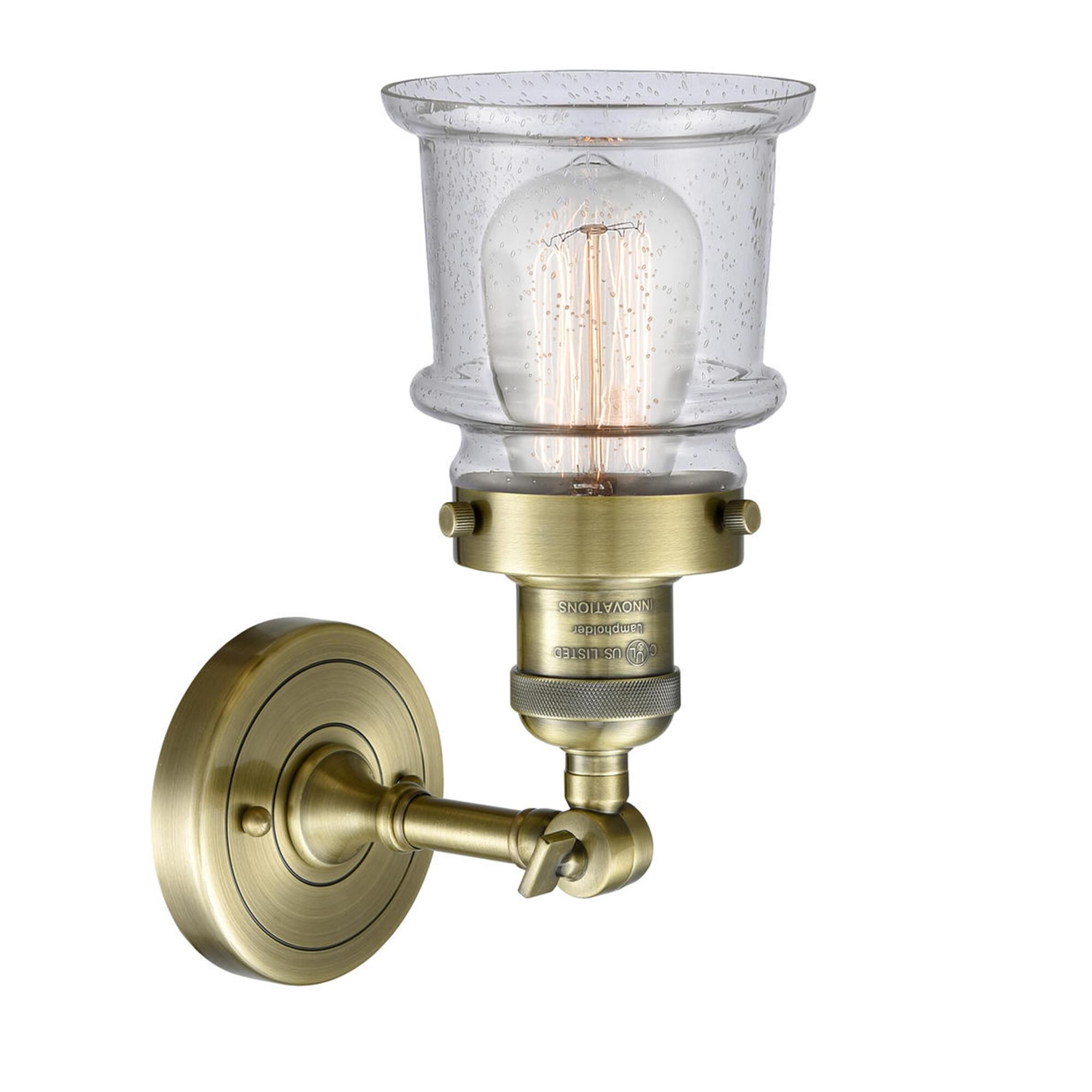 Shown in Antique Brass finish and Seedy glass