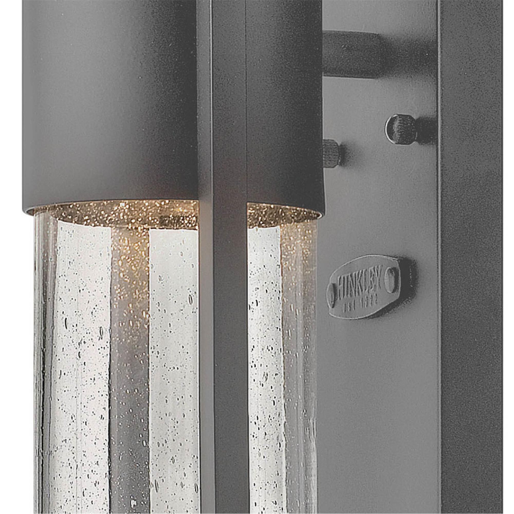 Shown in Hematite finish and Clear Seedy glass