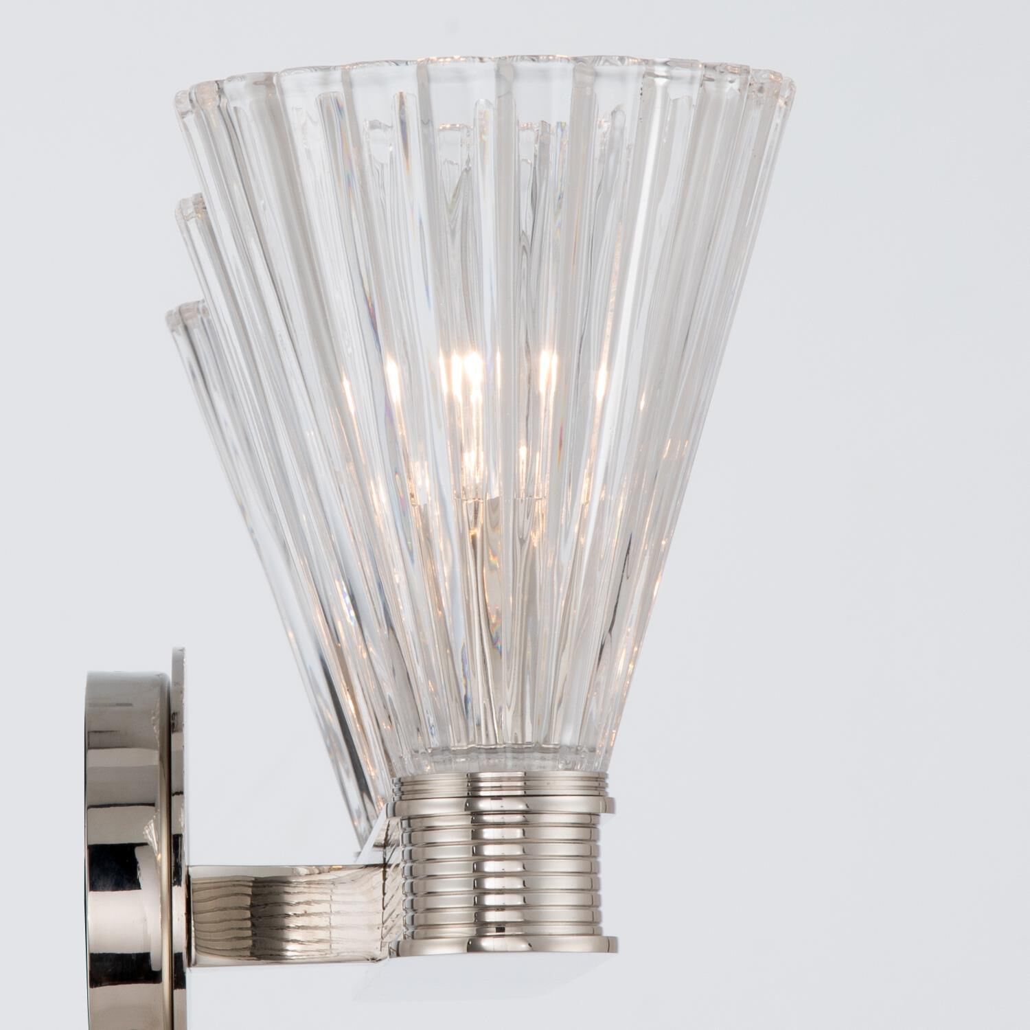 Shown in Polished Nickel finish and Glass shade