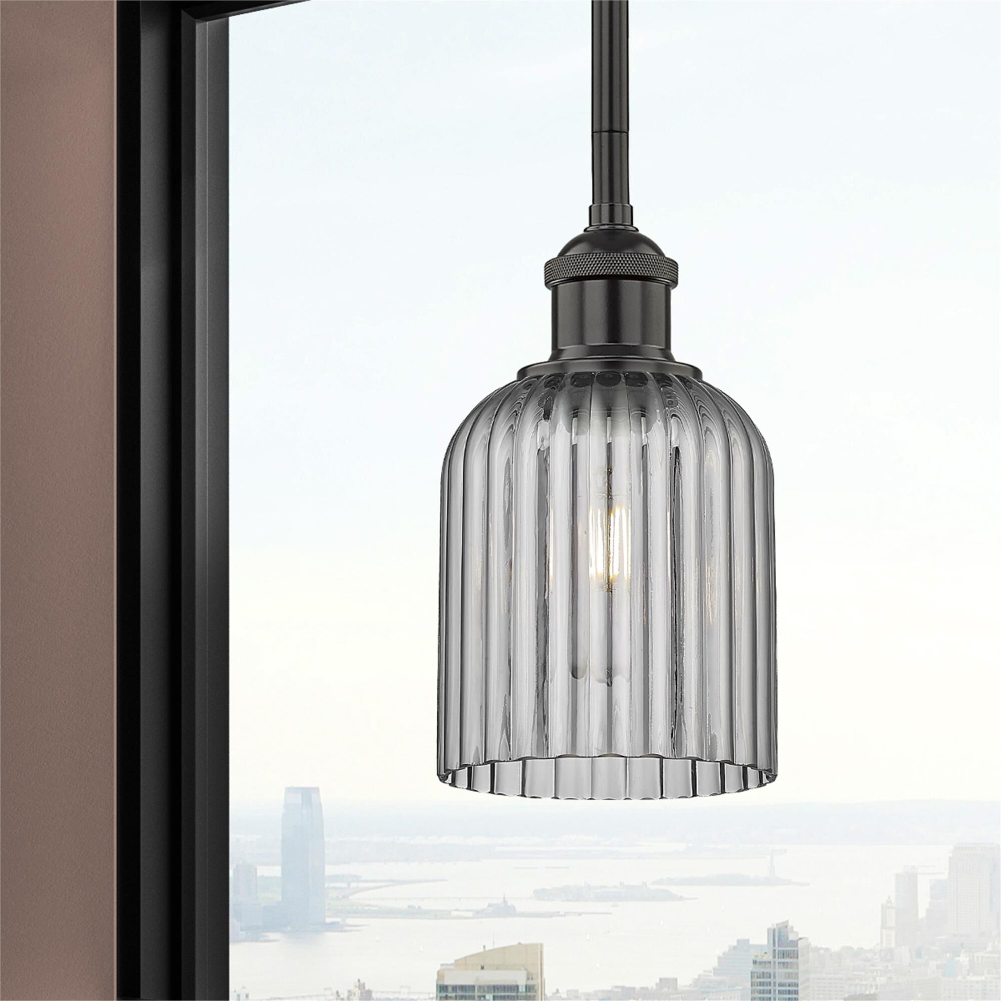 Shown in Matte Black finish and Light Smoke glass