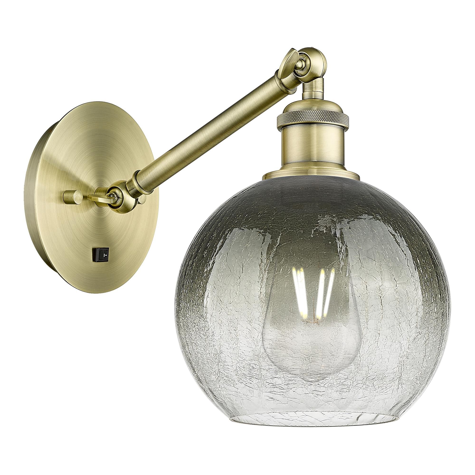 Shown in Antique Brass finish and Slate glass