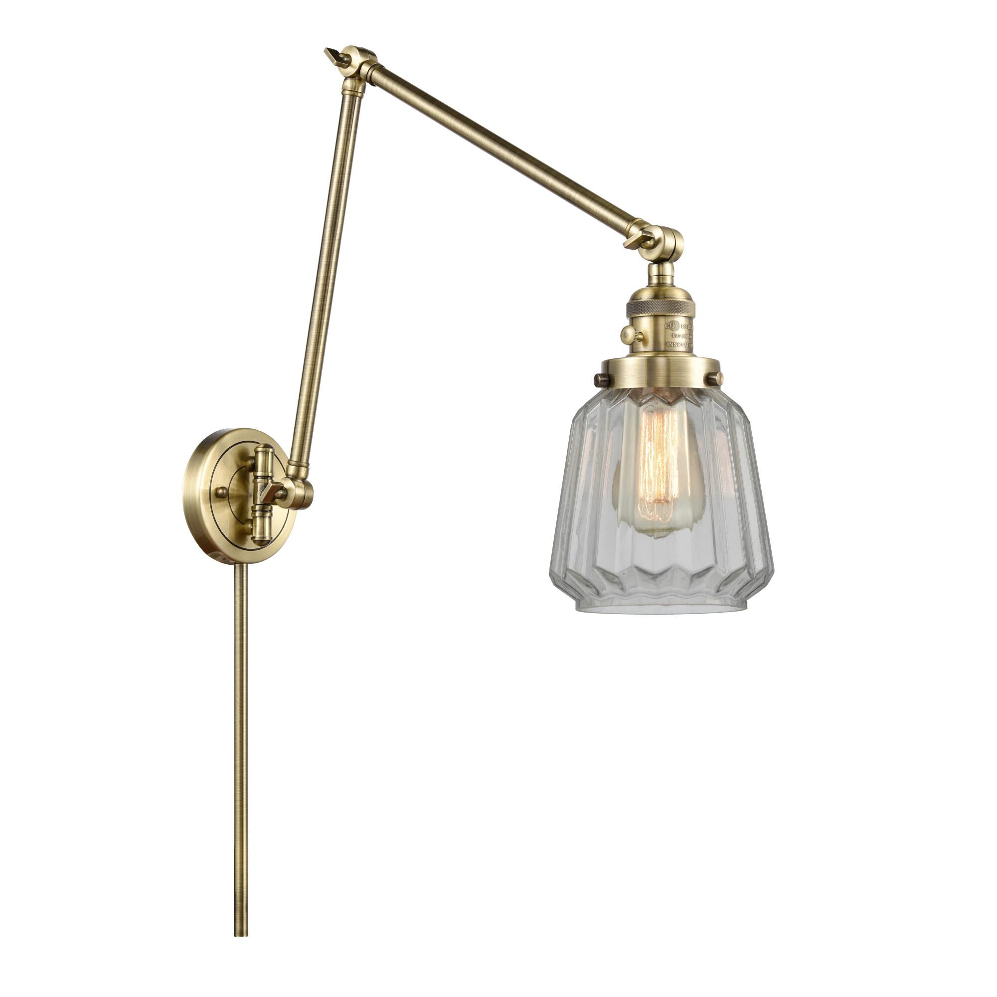 Shown in Antique Brass finish and Clear Chatham glass