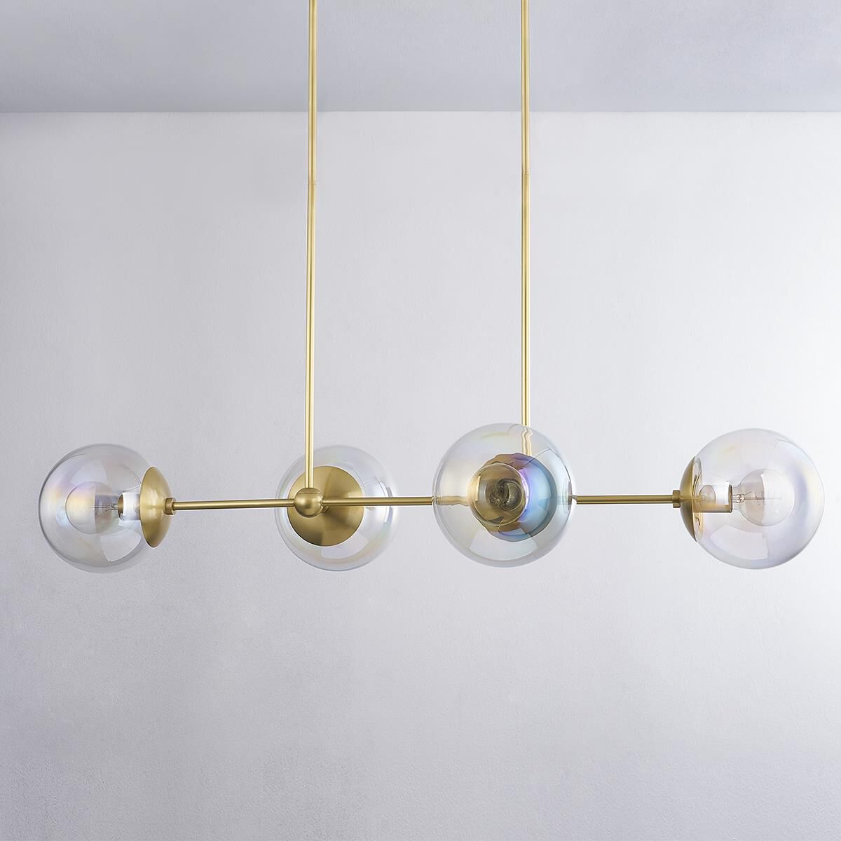 Shown in Aged Brass finish and Clear Plated Iridescent glass