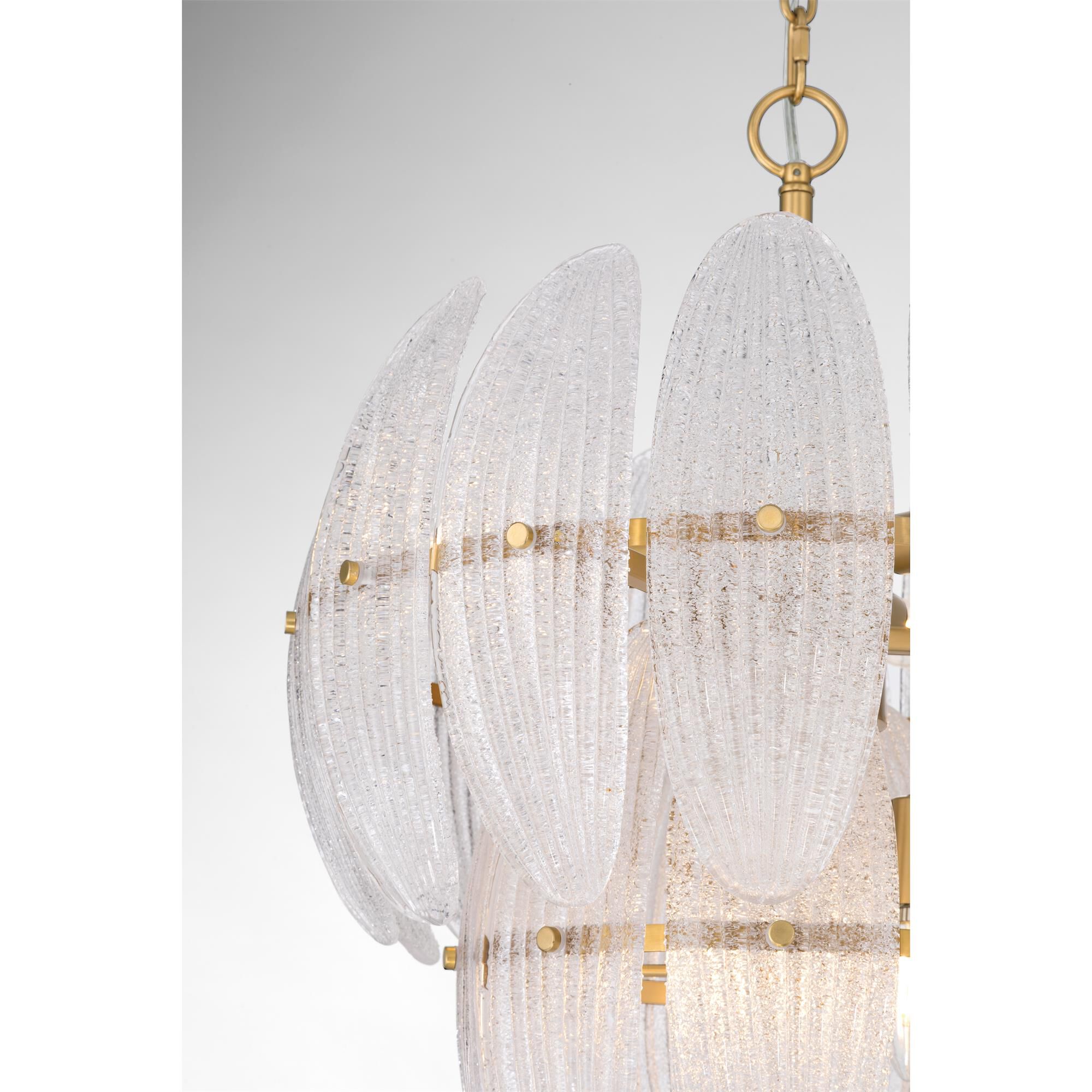 Shown in Legacy Brass finish and Clear Textured shade