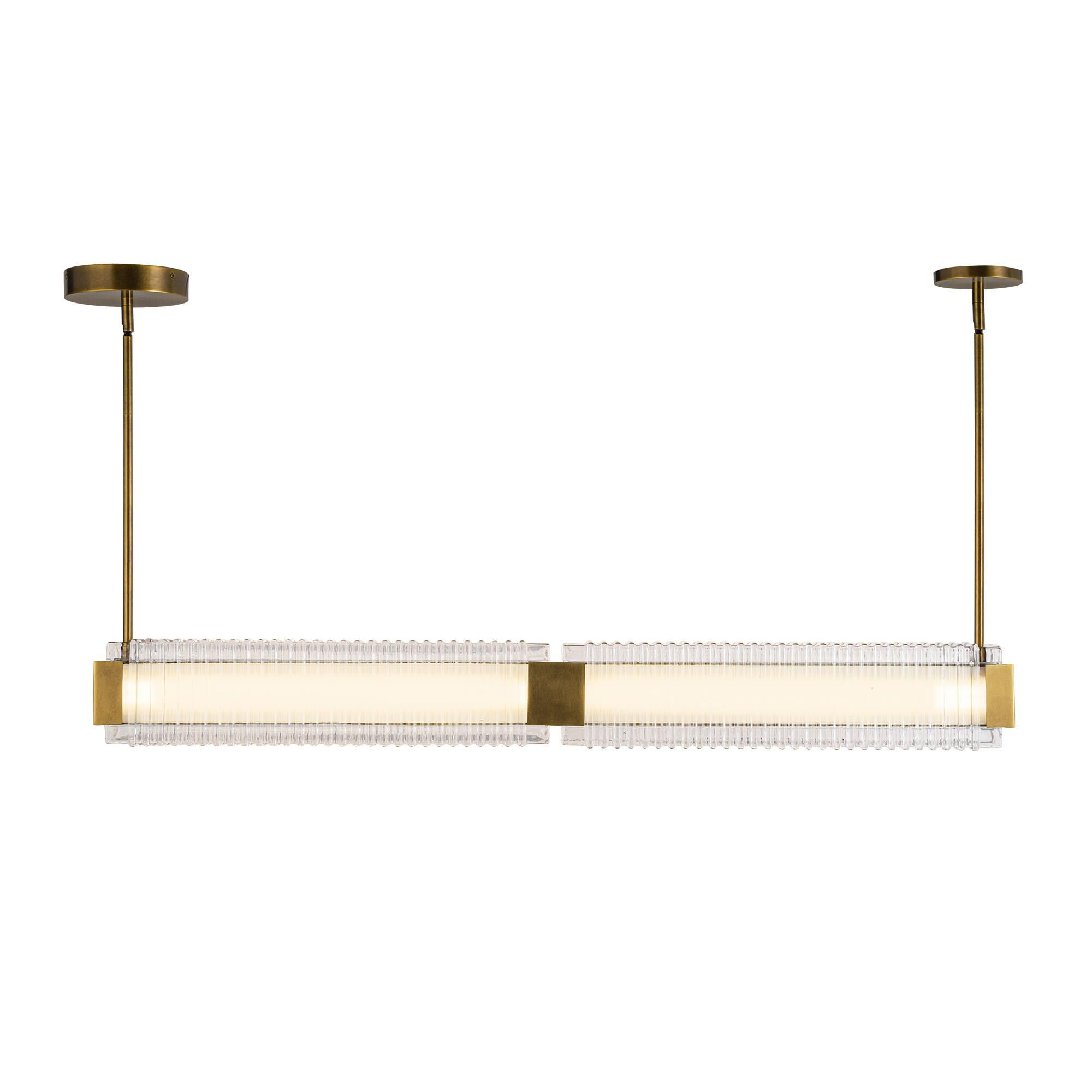 Shown in Vintage Brass finish and Clear Ribbed glass