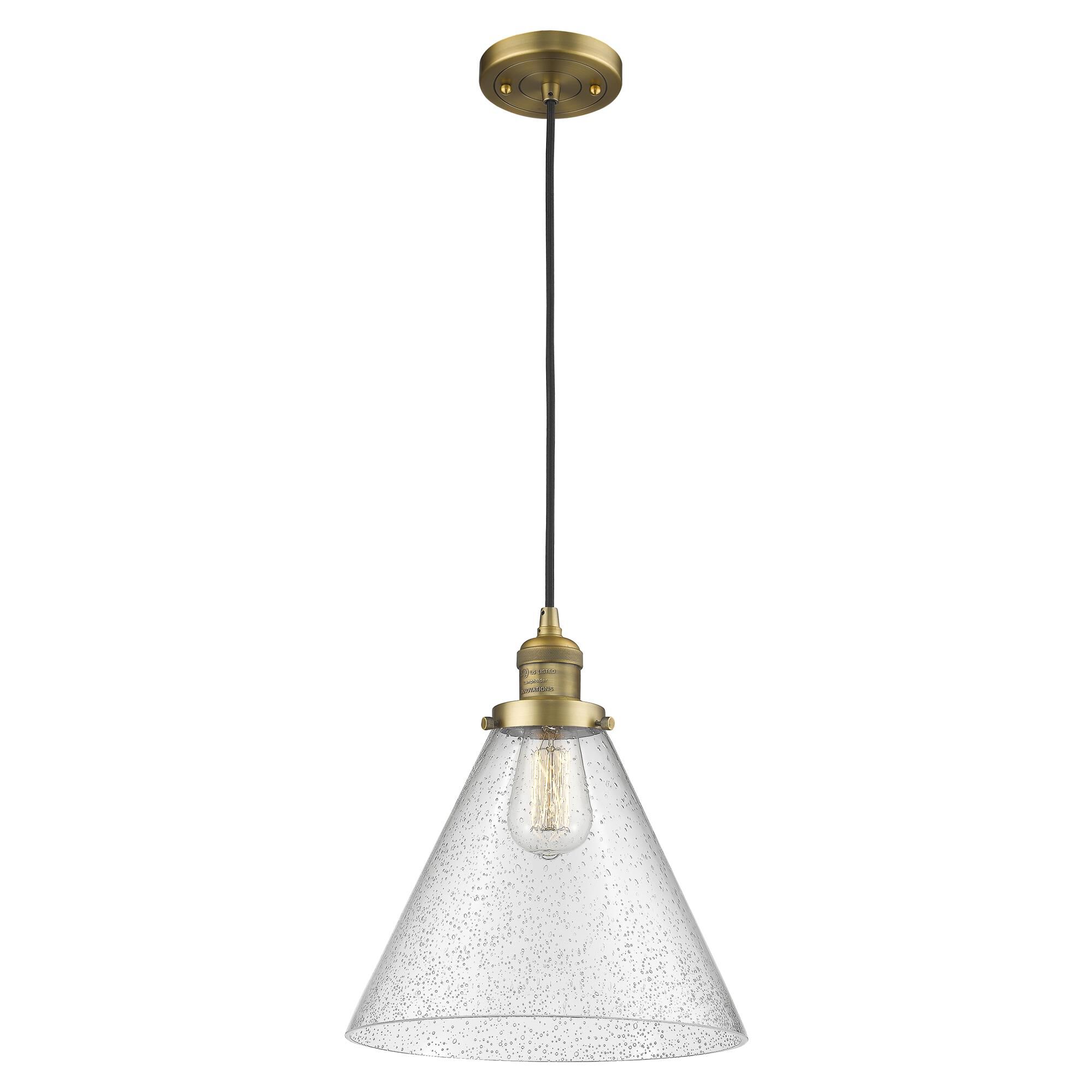 Shown in Brushed Brass finish and Seedy glass