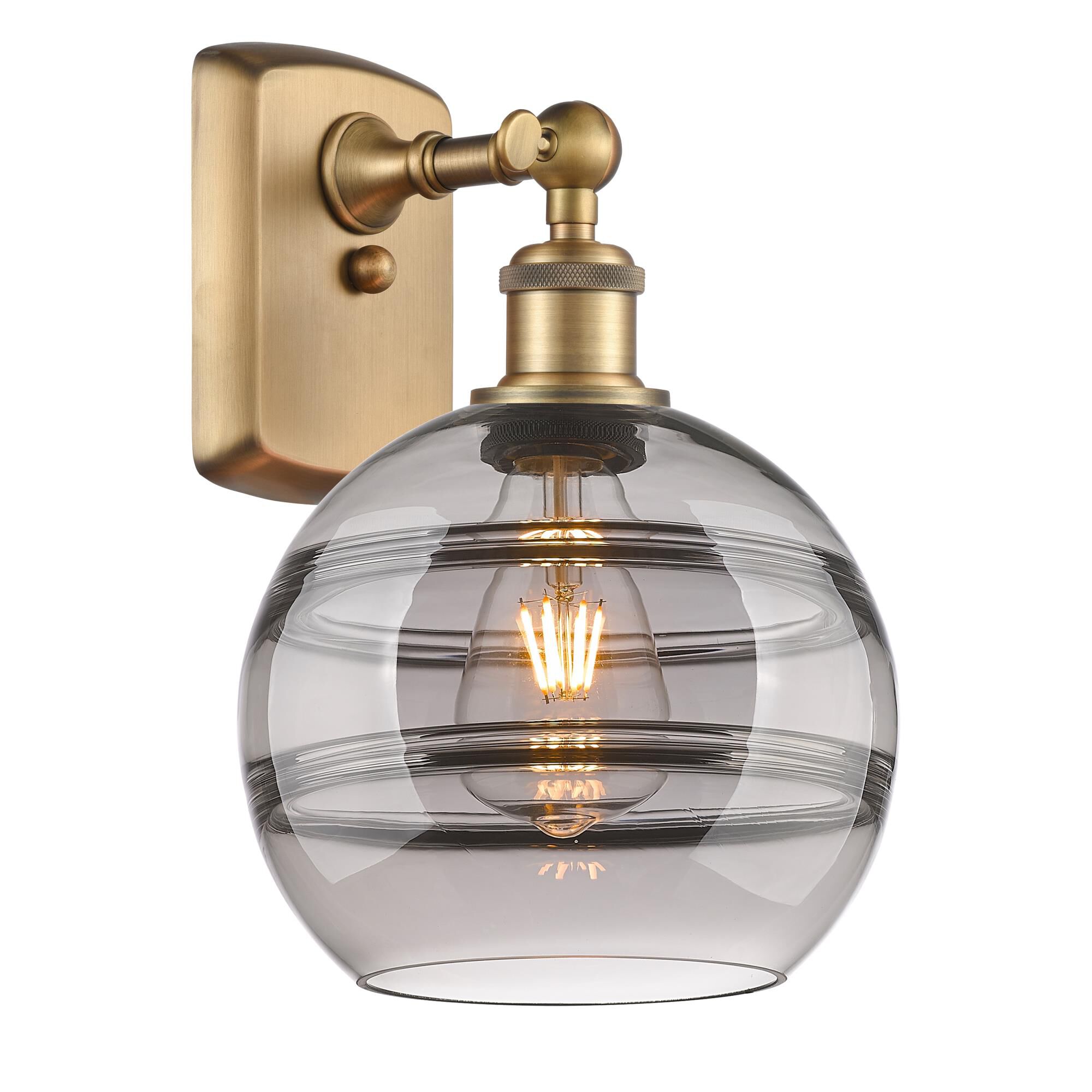 Shown in Brushed Brass finish and Light Smoke glass