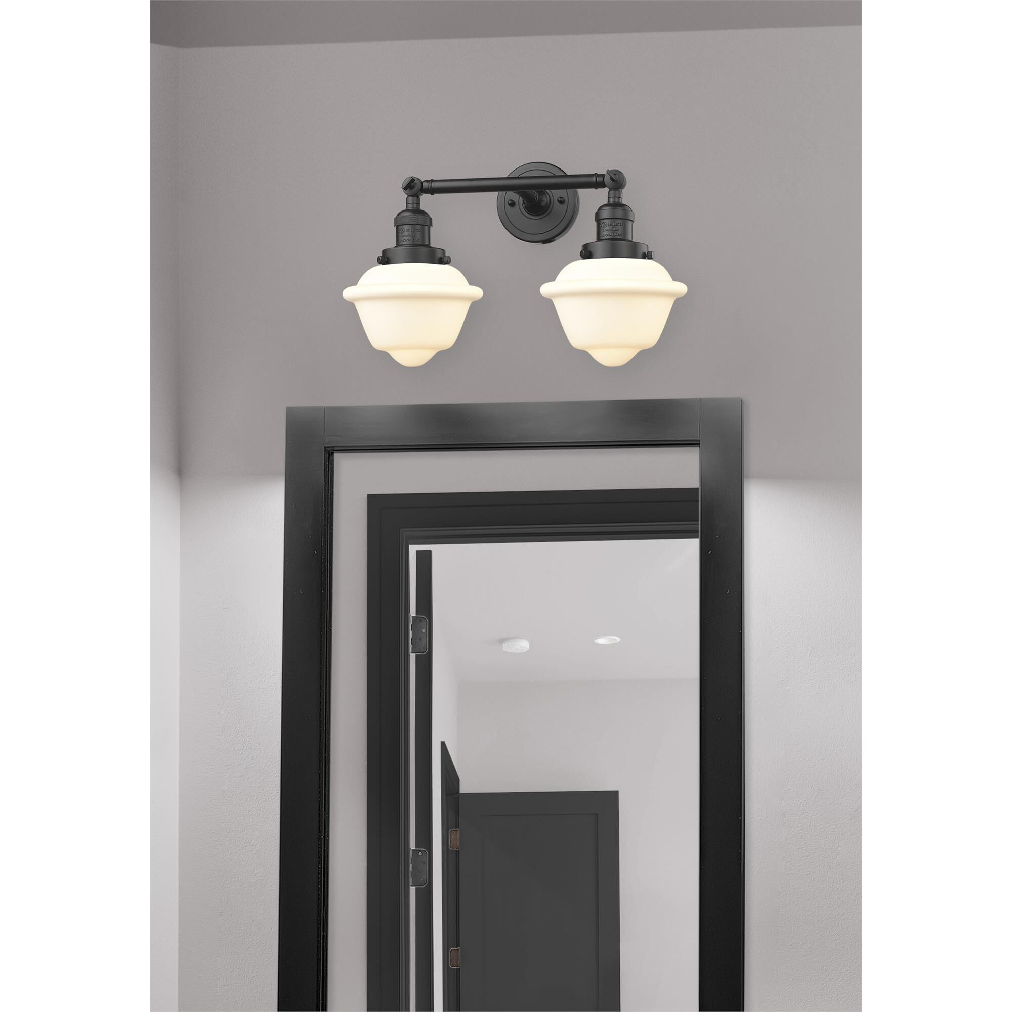 Shown in Oil Rubbed Bronze finish and Matte White Cased glass