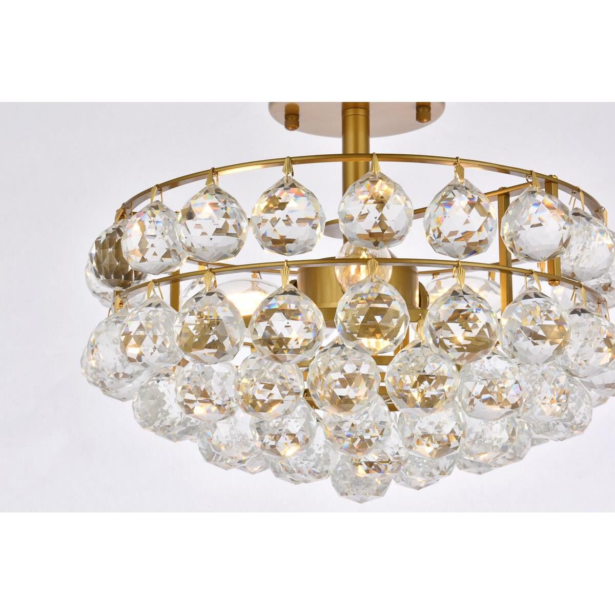 Shown in Brass finish and Royal Cut Clear crystal