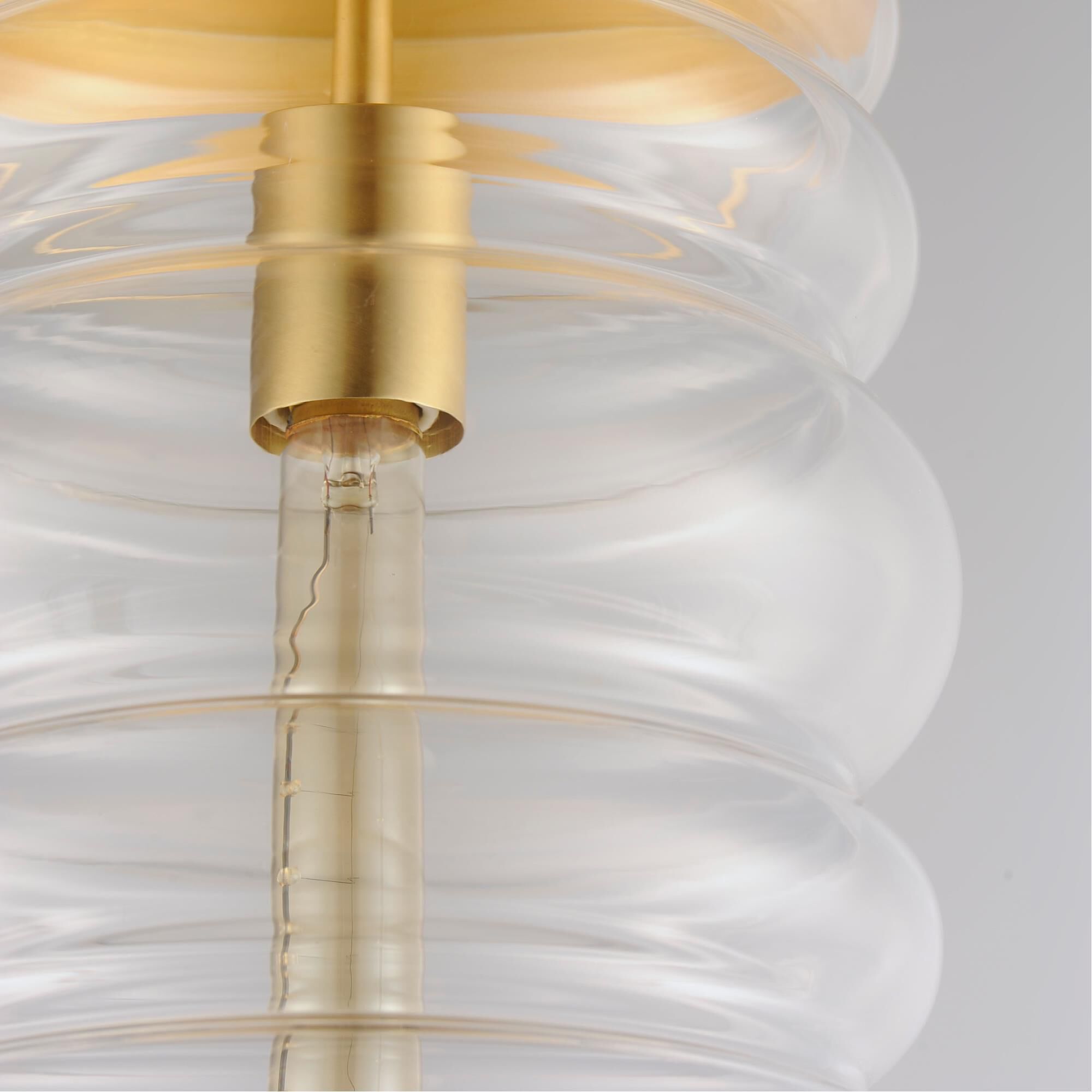 Shown in Satin Brass finish and Clear glass